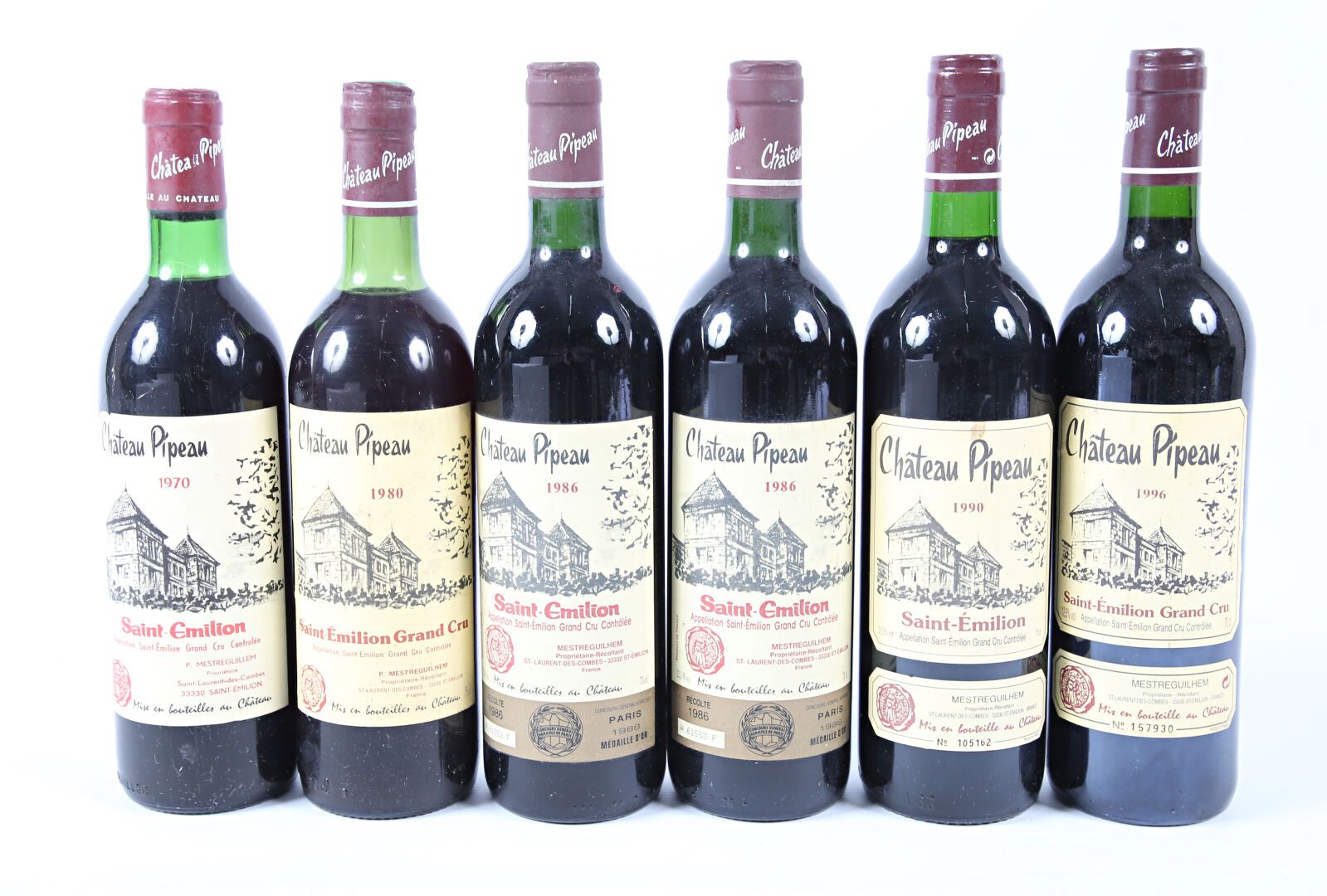 Null 6 bouteilles	Château PIPEAU	St Emilion GC	
	1 blle de 1996, 1 blle de 1990,&hellip;