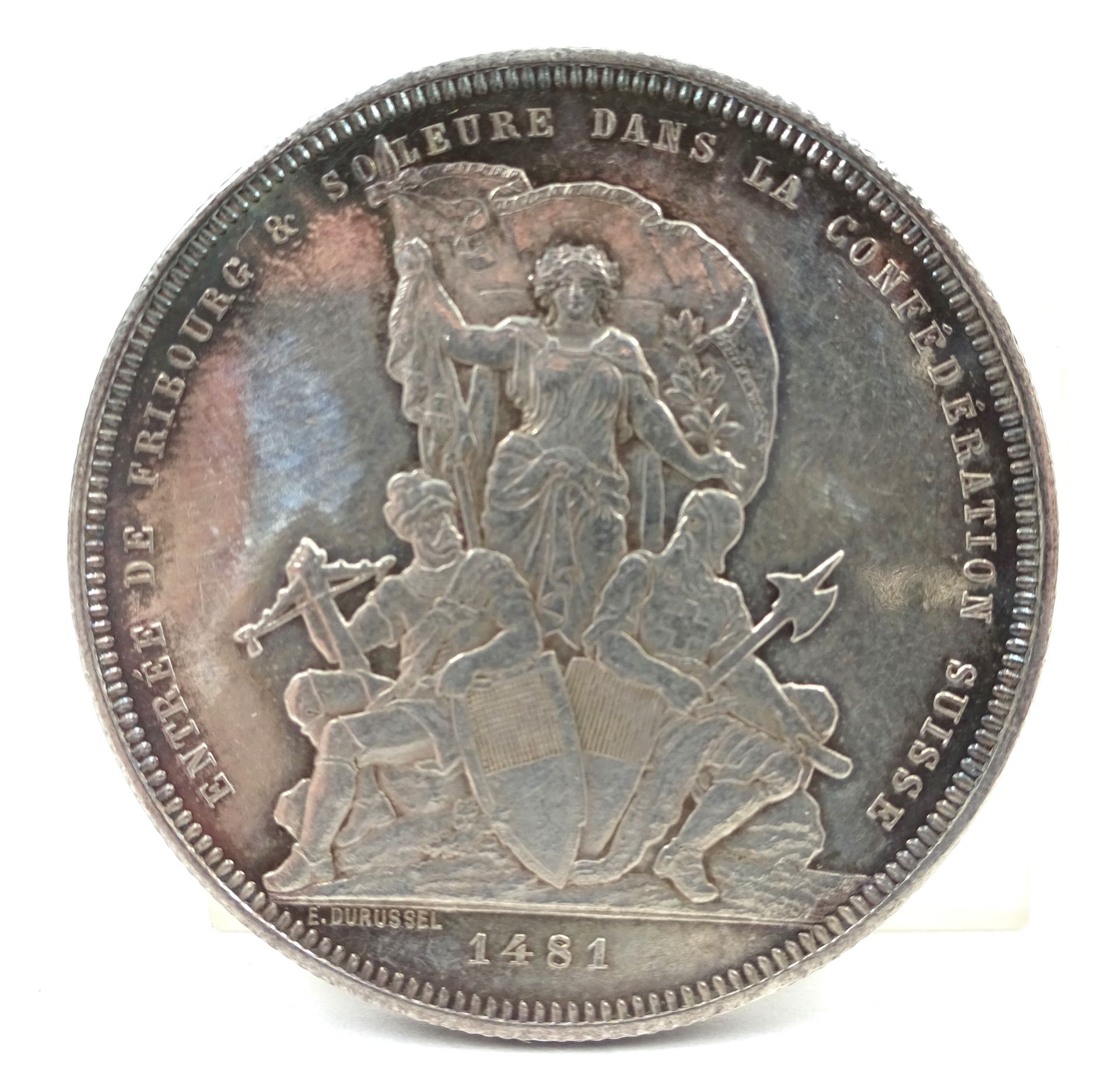 Null 5 Swiss franc silver coin, Tir fédéral à Fribourg, 1881. 24.95 g net.