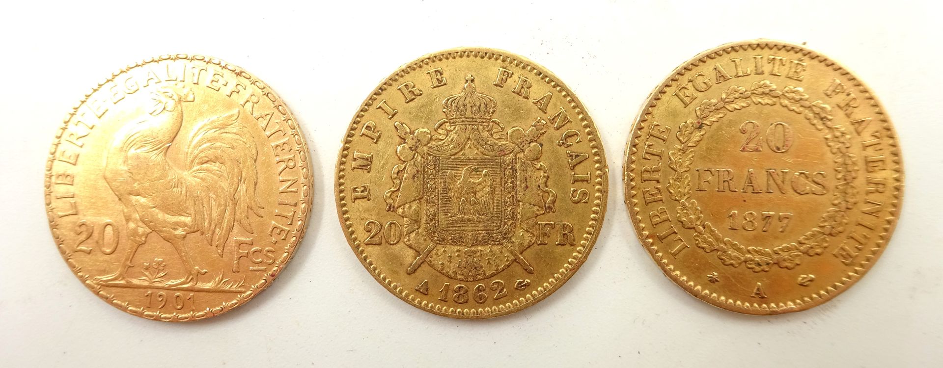 Null 三枚20法郎金币：拿破仑三世1862年A金币；盖尼1877年A金币；玛丽安/科克1901年金币。净重 19.31 克。