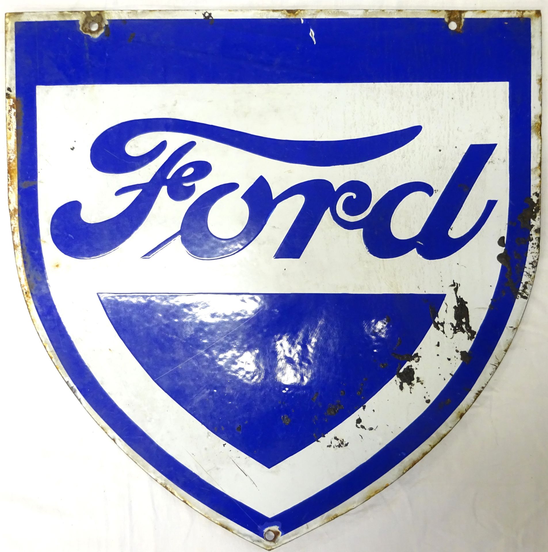 Null Placa esmaltada Ford por ambas caras (desconchones y suciedad). 61 x 60 cm