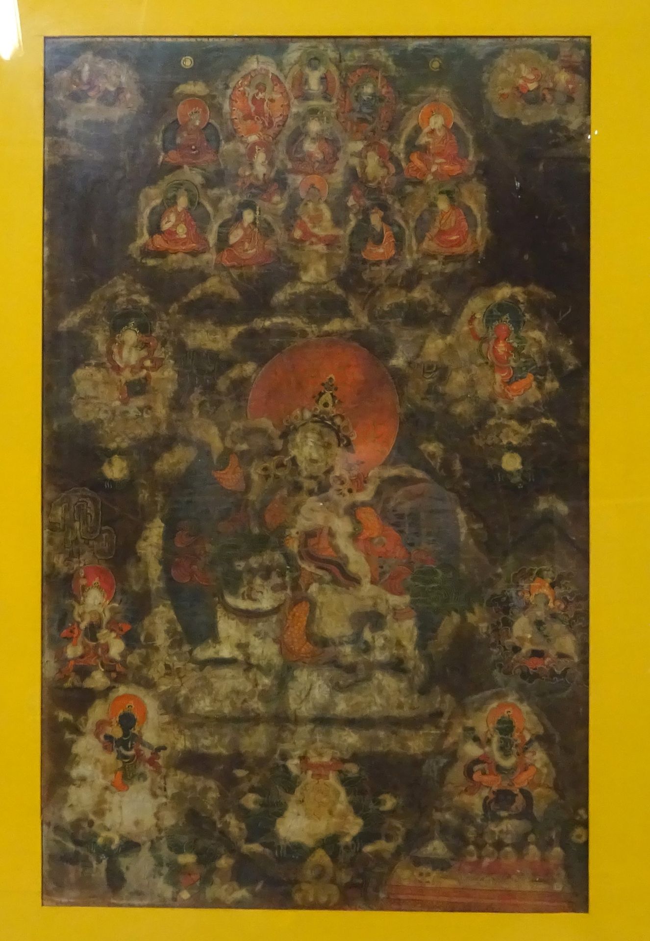 Null Tangka depicting Buddhist deities. Tempera and gilding on silk, framed unde&hellip;