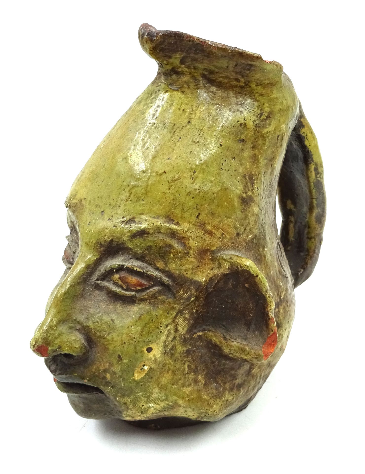 Null Piccola brocca antropomorfa in argilla smaltata verde, con il volto di un p&hellip;