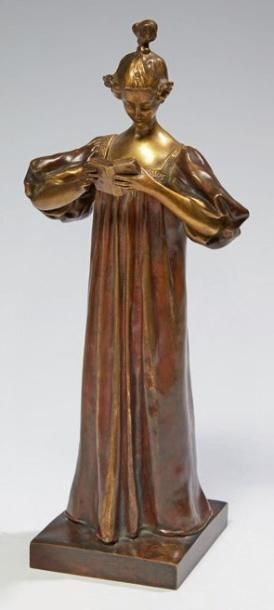 CLERGET Alexandre (1856-1931) La lecture Sculpture en bronze à double patine or &hellip;
