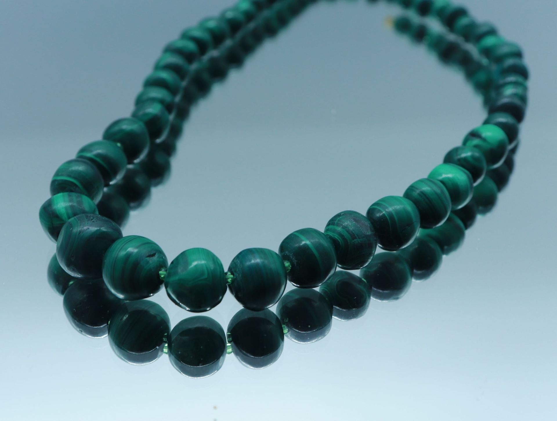 Null Necklace in fall of balls of malachite, the clasp in metal. Length : 48 cm &hellip;
