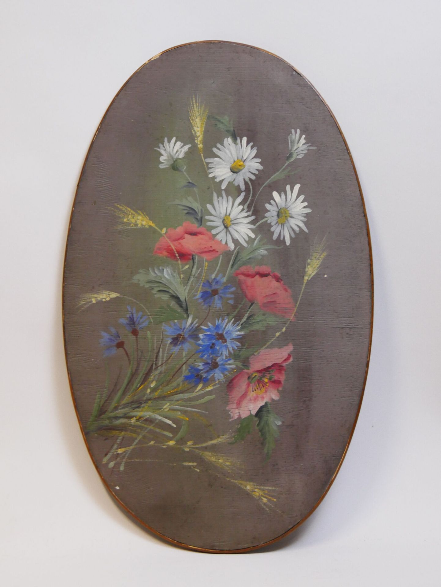 Null 20世纪初的学校

法国田野上的花朵（玛格丽特、罂粟、矢车菊和麦穗）。

椭圆形面板上的油画，无签名

54,5 x 33 cm



领取拍品的时间&hellip;