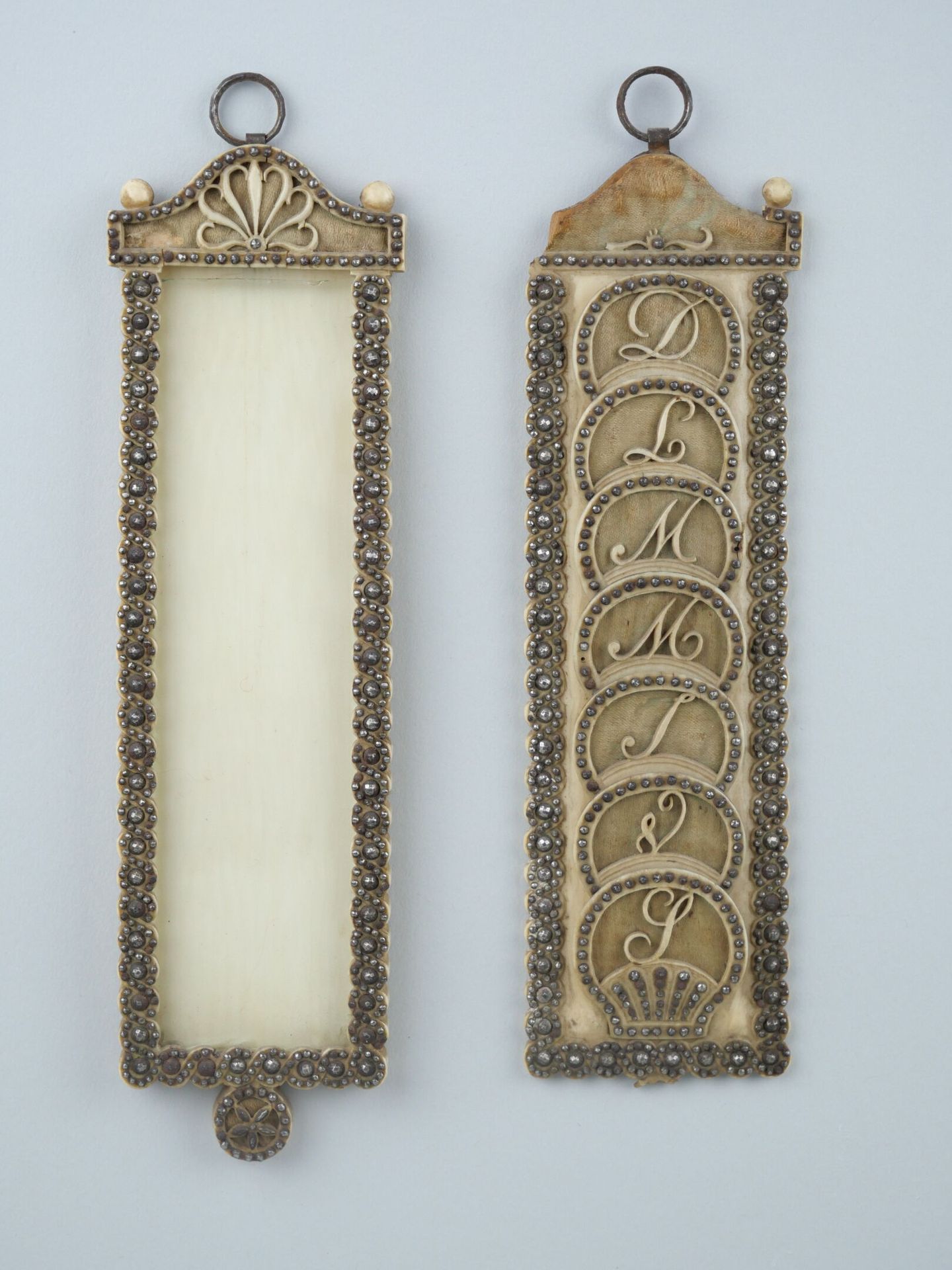 Null Two ivory and marcasite sconces, one of which is a semainier.

Charles X pe&hellip;
