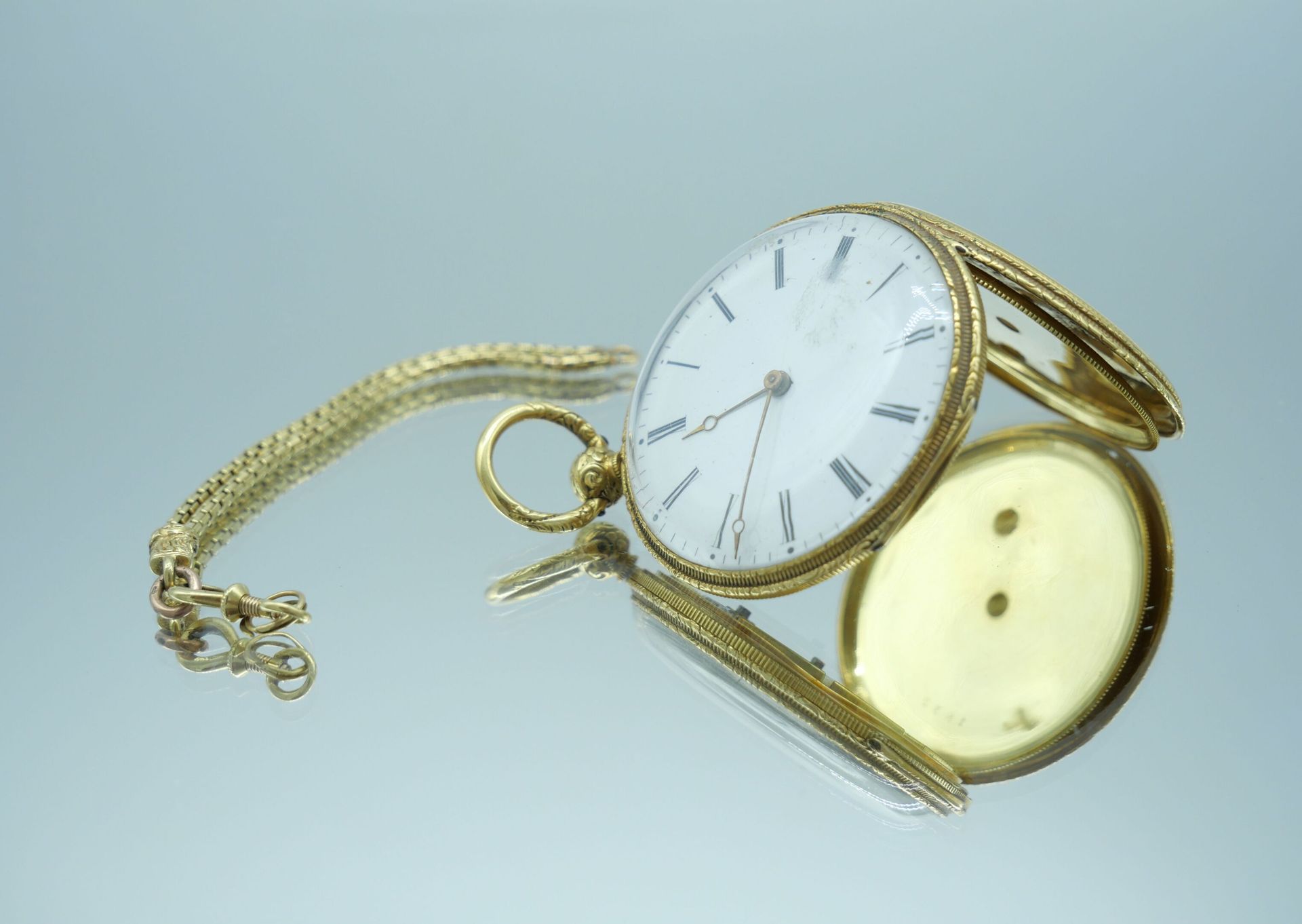 Null Taschenuhr, Gehäuse aus 750er Gold, kreisförmiges Zifferblatt aus weißem Em&hellip;