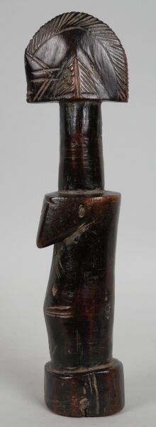 Null BURKINA FASO - MOSSI people 

Fertility doll in wood with dark brown patina&hellip;