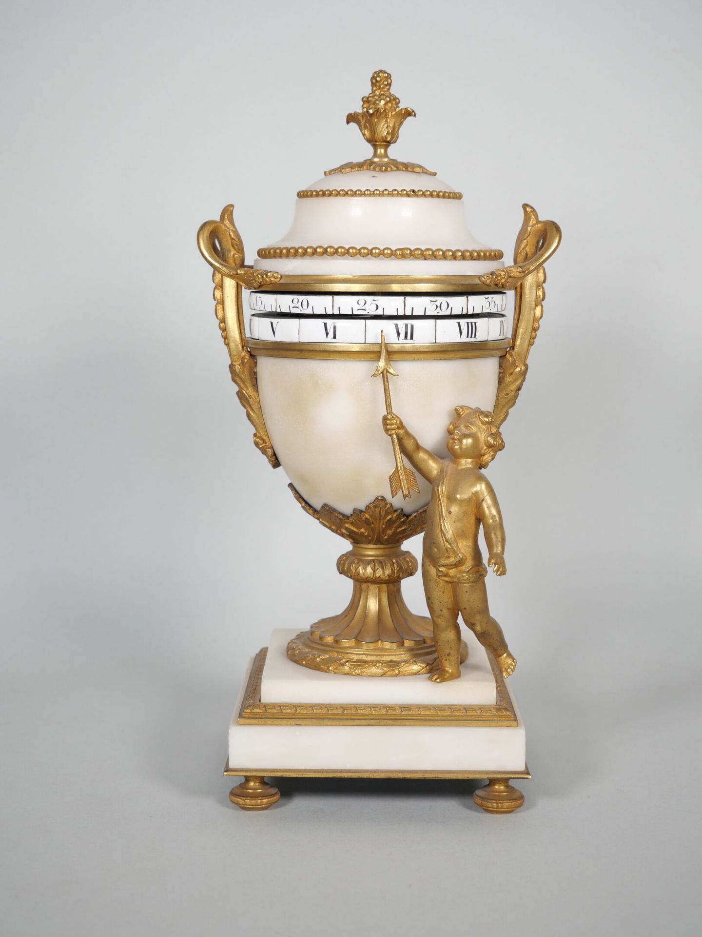 Null White marble and ormolu desk clock in the shape of an antique urn. A love w&hellip;