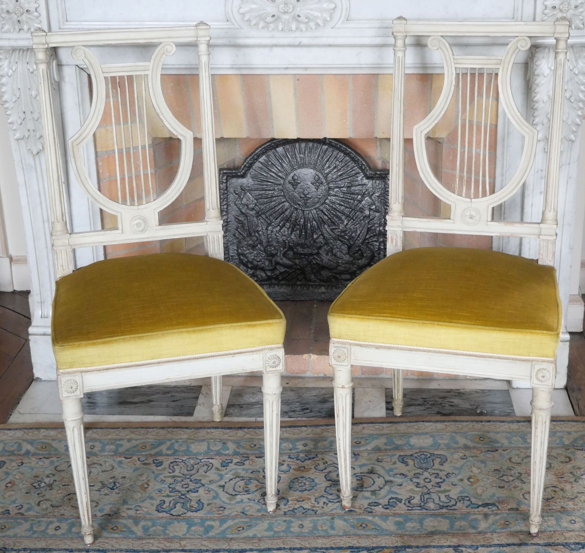Null Pair of grey lacquered wood lyre-back chairs, tapered and fluted legs. 
Lou&hellip;