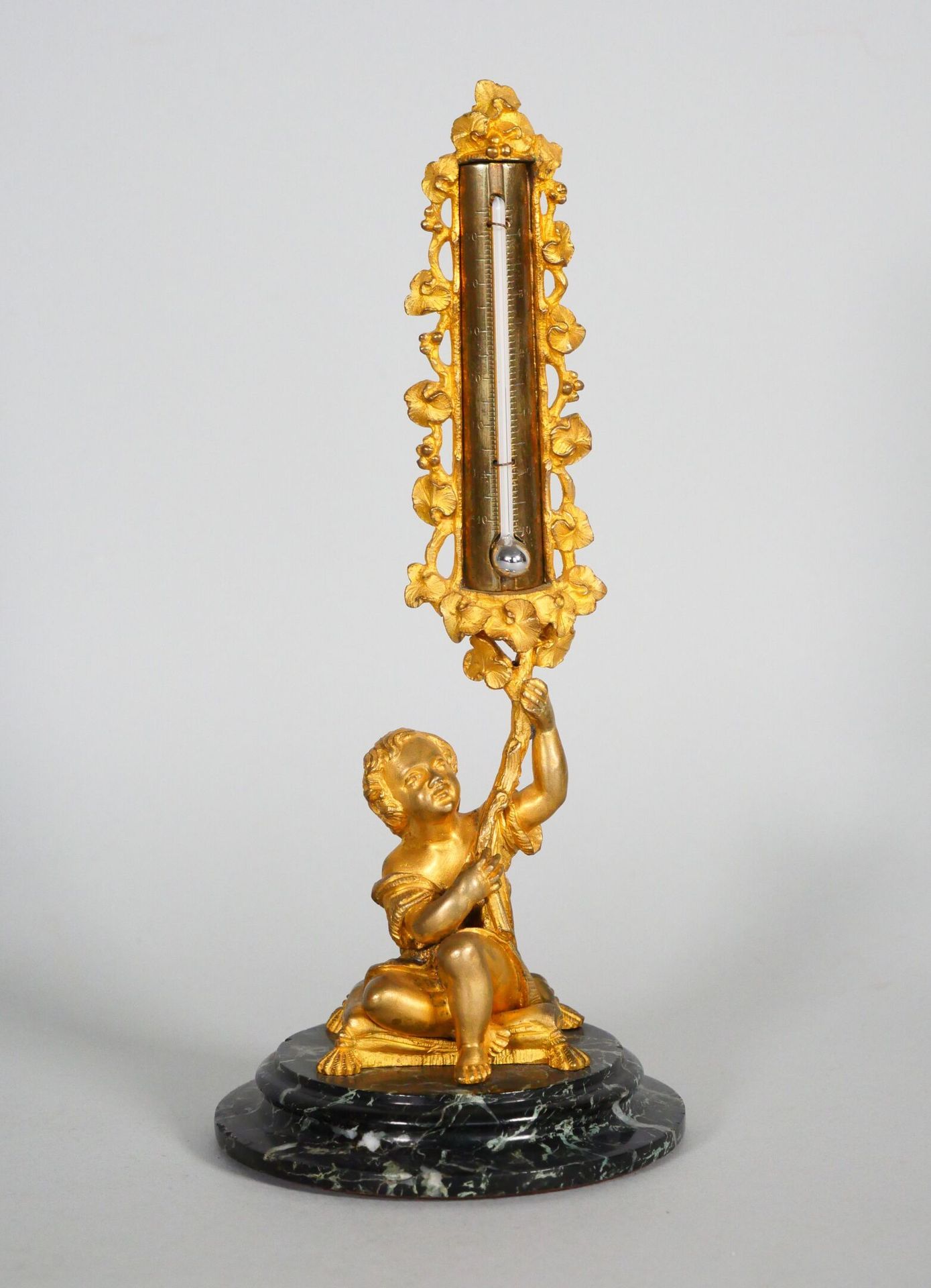 Null Gilt bronze and sea-green marble desk thermometer depicting a child sitting&hellip;