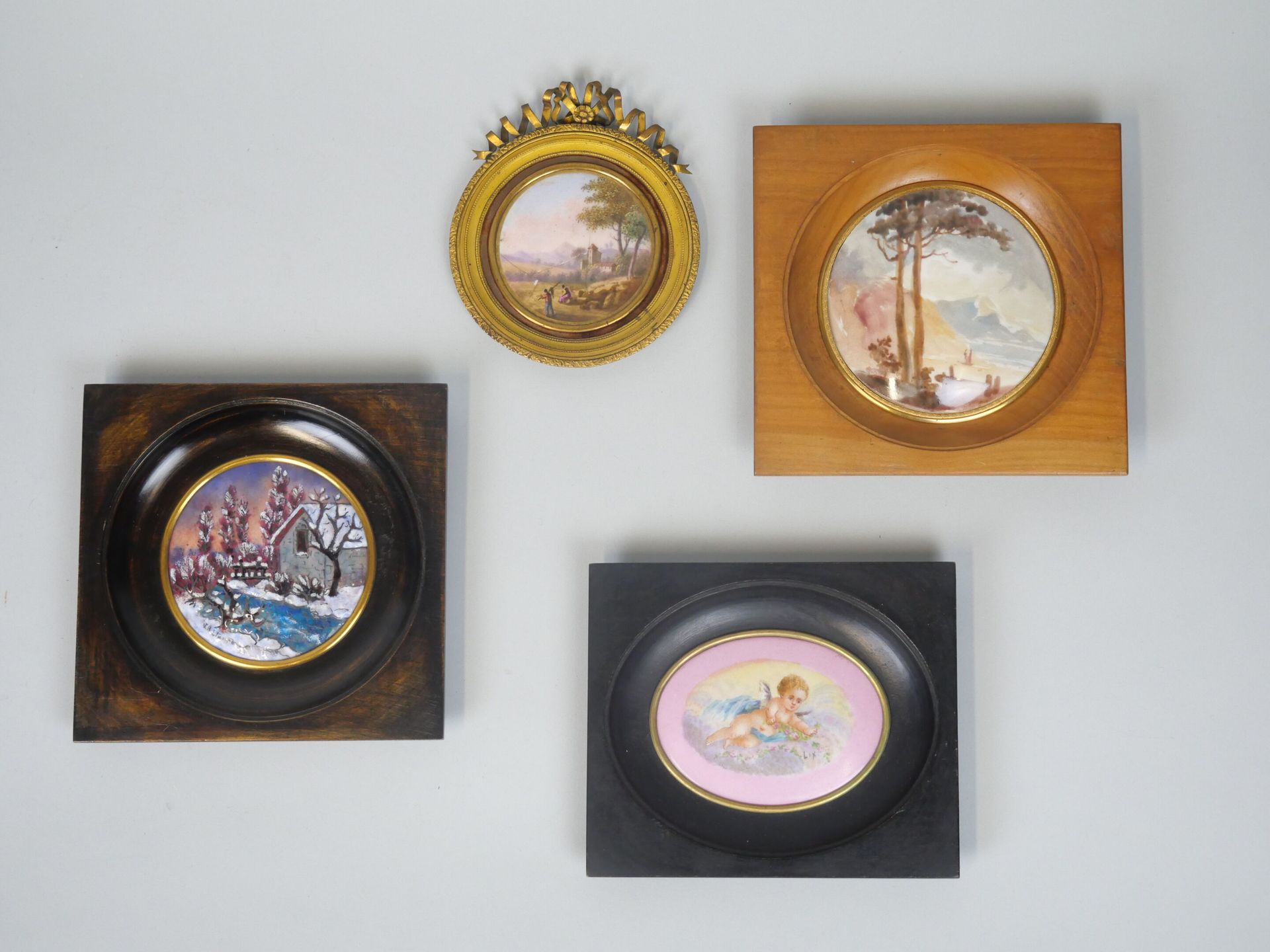 Null Meeting of paintings on porcelain framed including :
- a landscape in a cir&hellip;