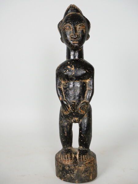 Null COTE D'IVOIRE - peuple BAOULE

Statuette en bois à patine végétale noire, r&hellip;