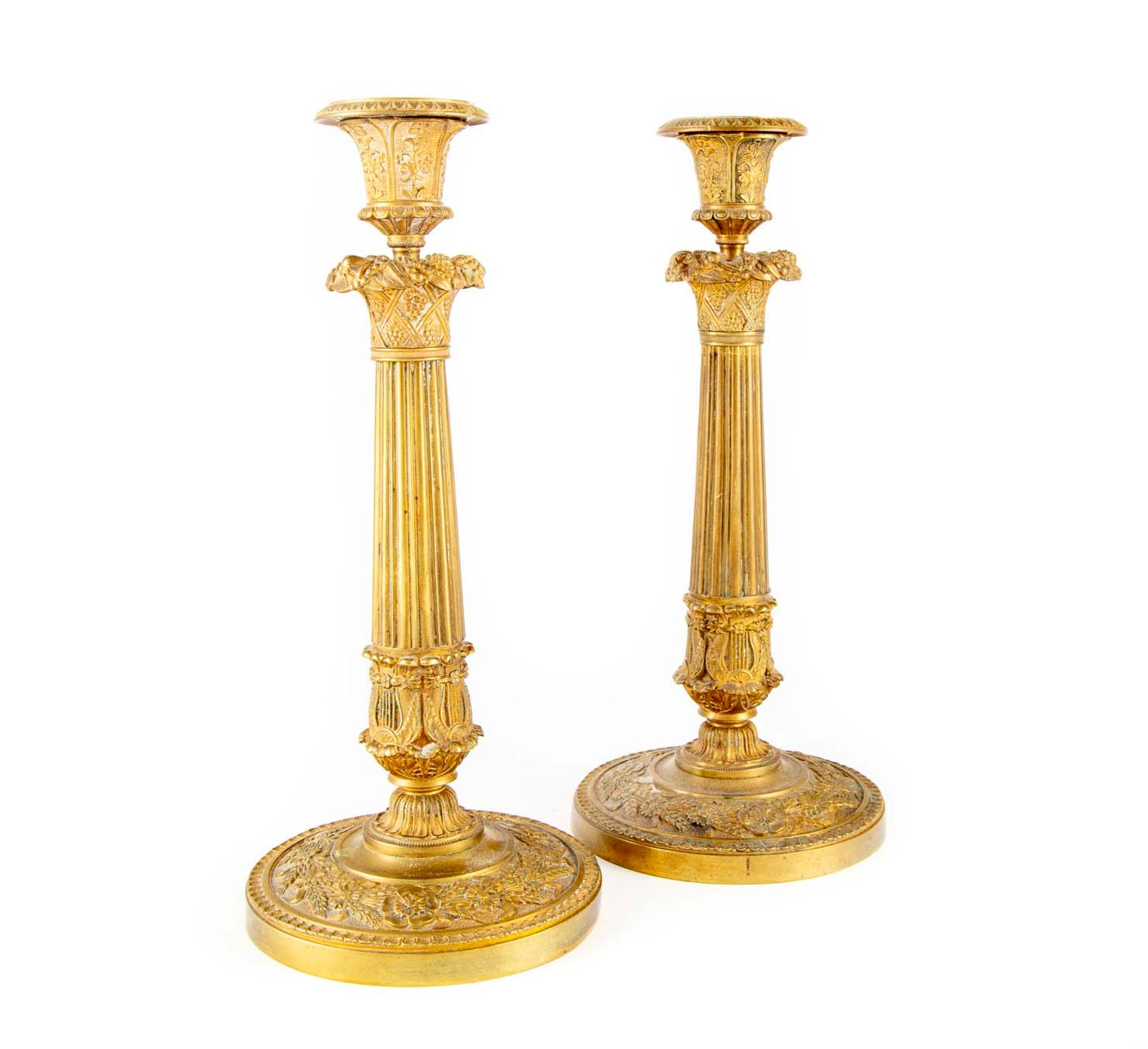 Null Pair of large bronze candlesticks richly chased with flowers, ears of wheat&hellip;