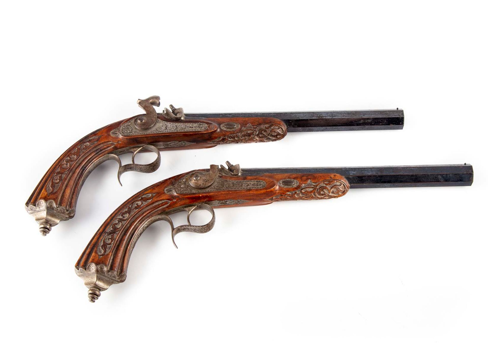 Null Pair of percussion pistols with blued and fluted octagonal barrels, marked &hellip;