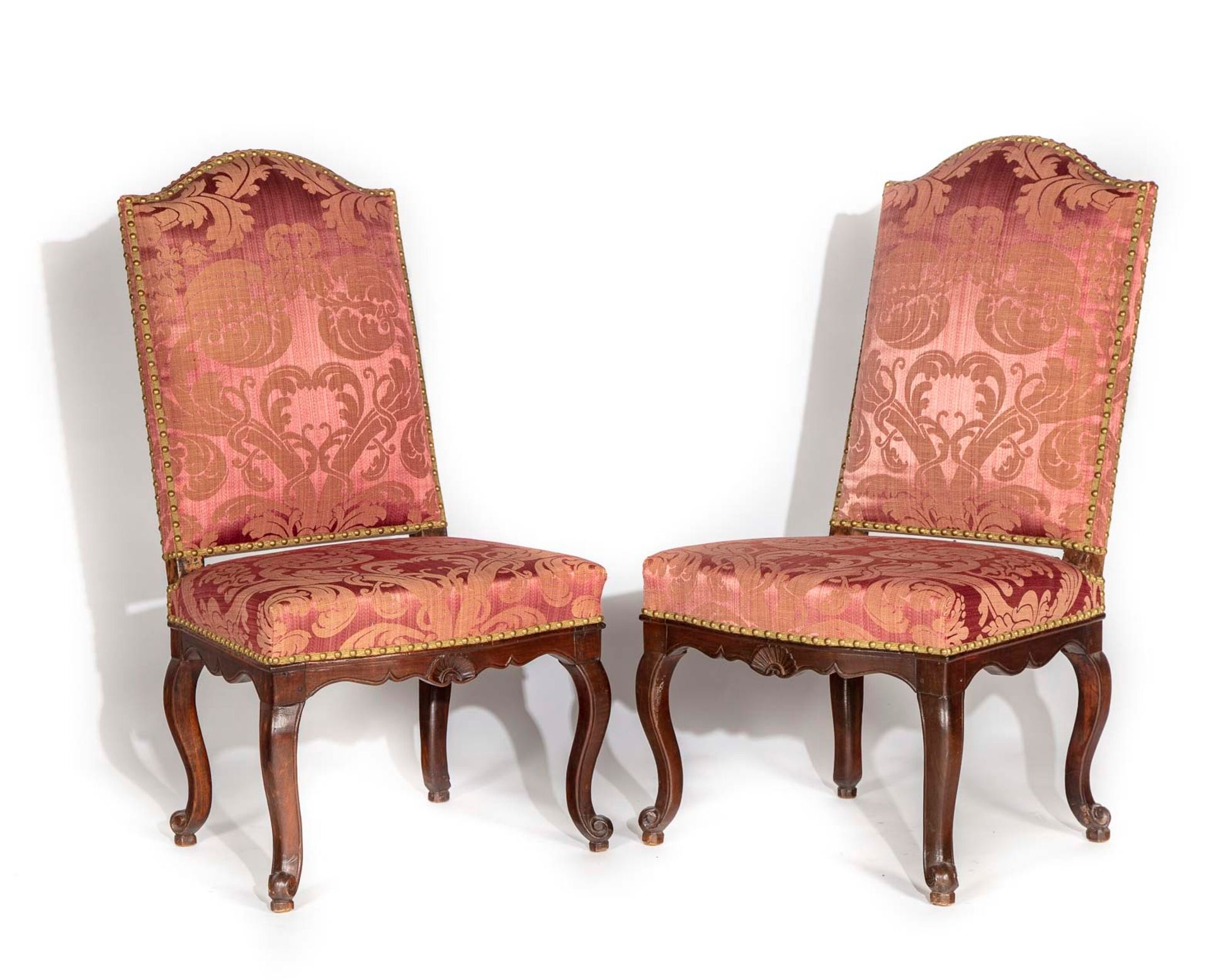 Null Pair of stained walnut chairs with high upholstered backs, scalloped belt, &hellip;