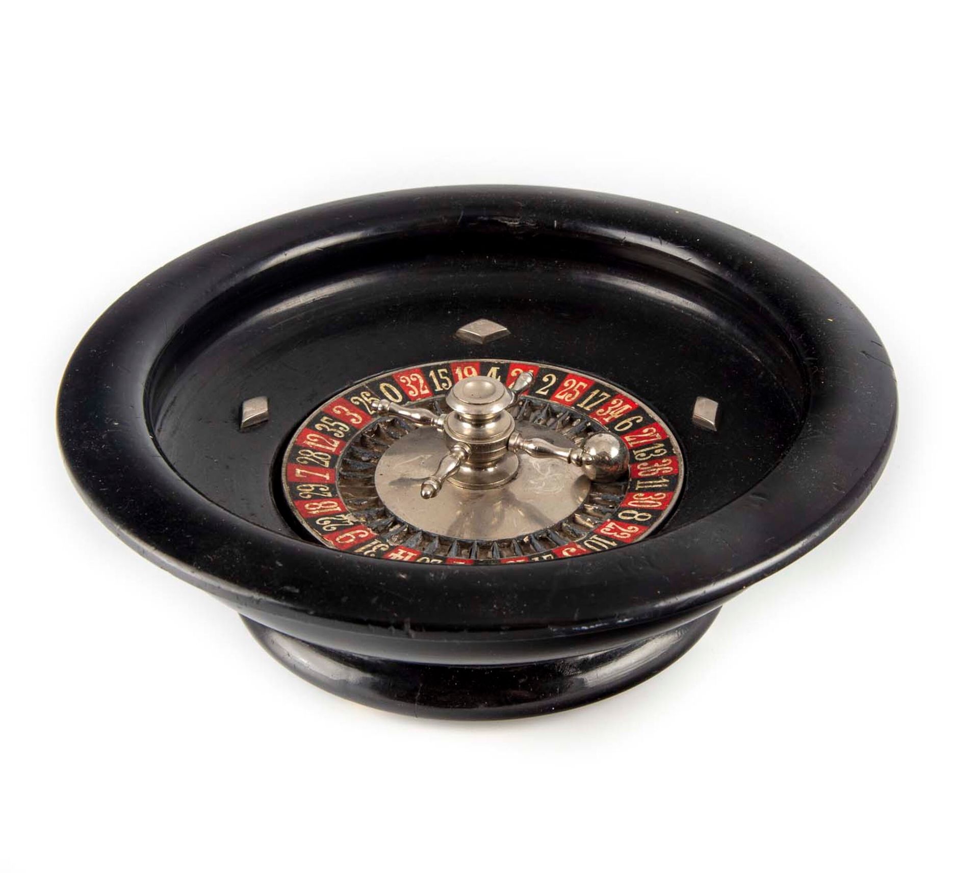 Null Small casino roulette wheel in blackened wood

D. 20 cm ; H. : 6 cm