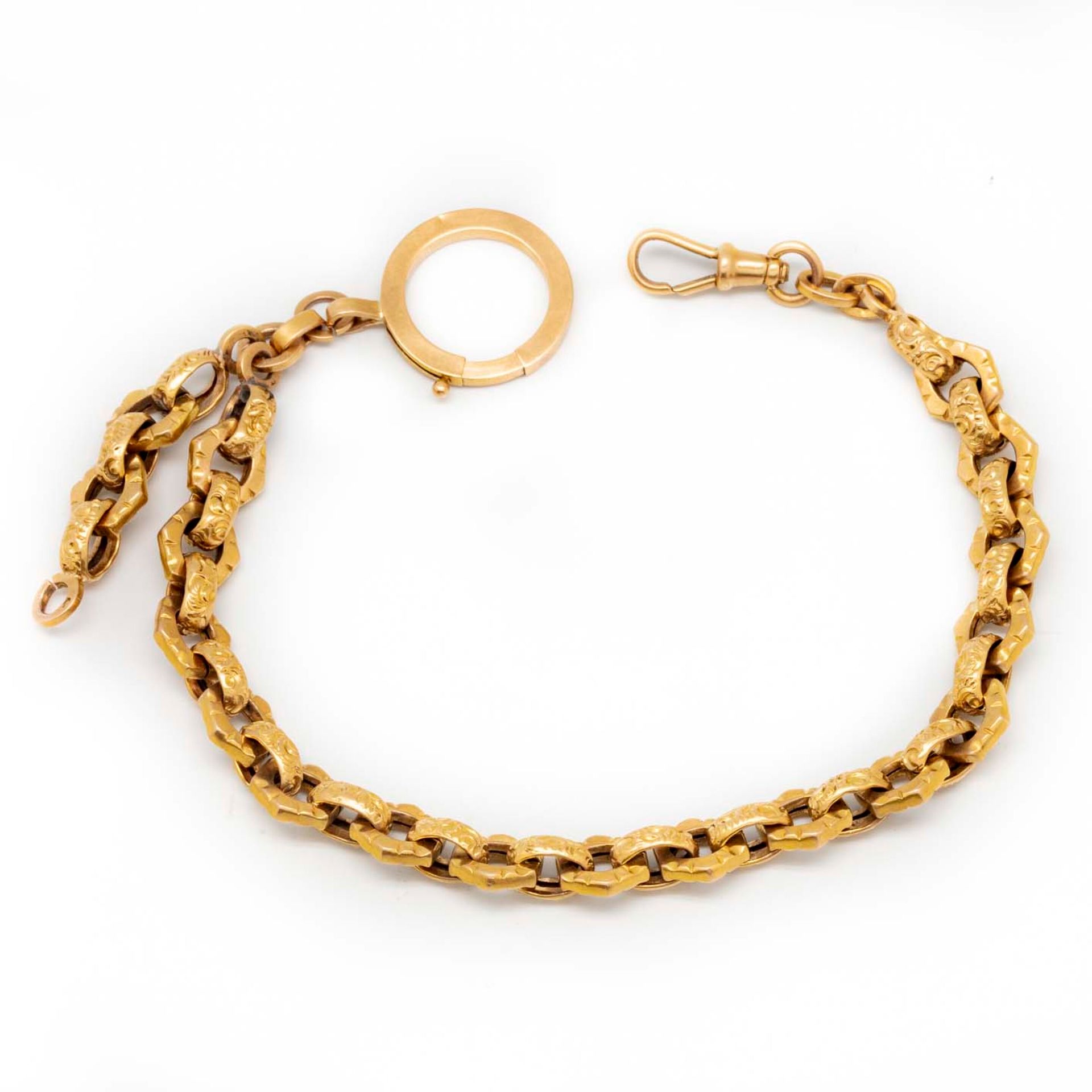 Null Yellow gold watch chain

Weight : 16 g.