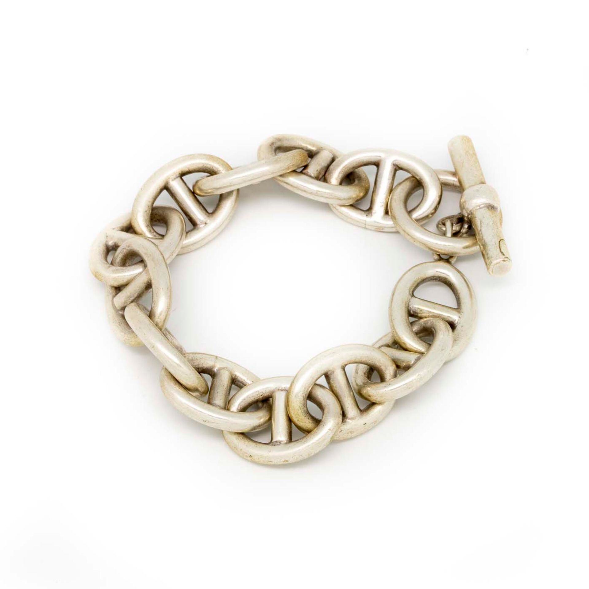 Null Curb in argento, anelli di catena di ancoraggio

Peso: 90 g.