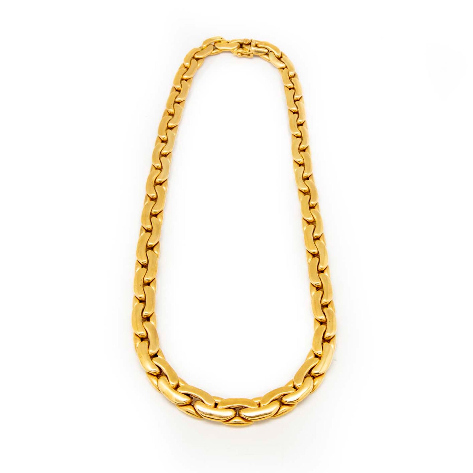 Null Gelbgold-Halskette mit flachen, gegliederten Gliedern

Gewicht : 62 g.