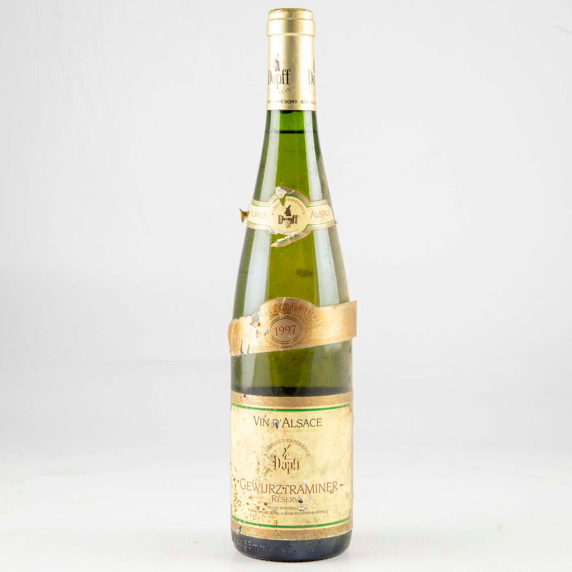 Null 1 bouteille ALSACE 1997 Gewurztraminer Dopff

Etiquette fanée et griffures