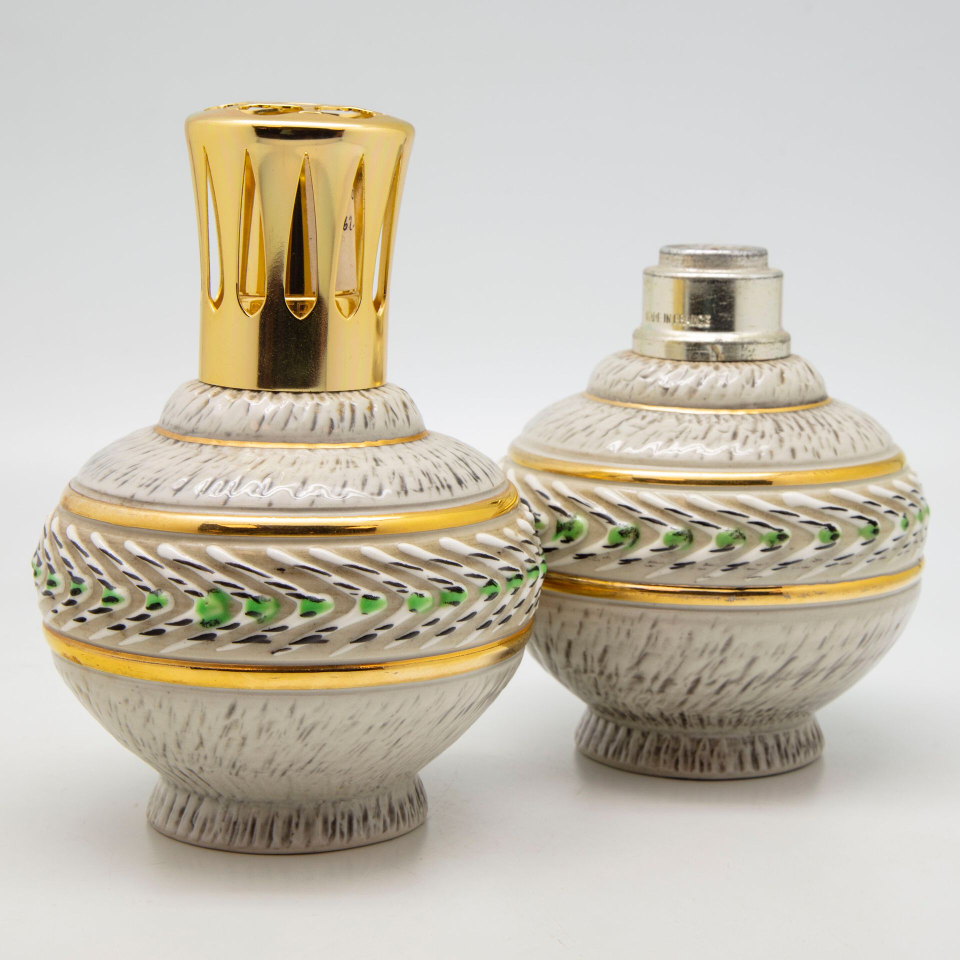 Null Jacques BREUGNOT

Paire de lampes BERGER en céramique à décor émaillé et do&hellip;