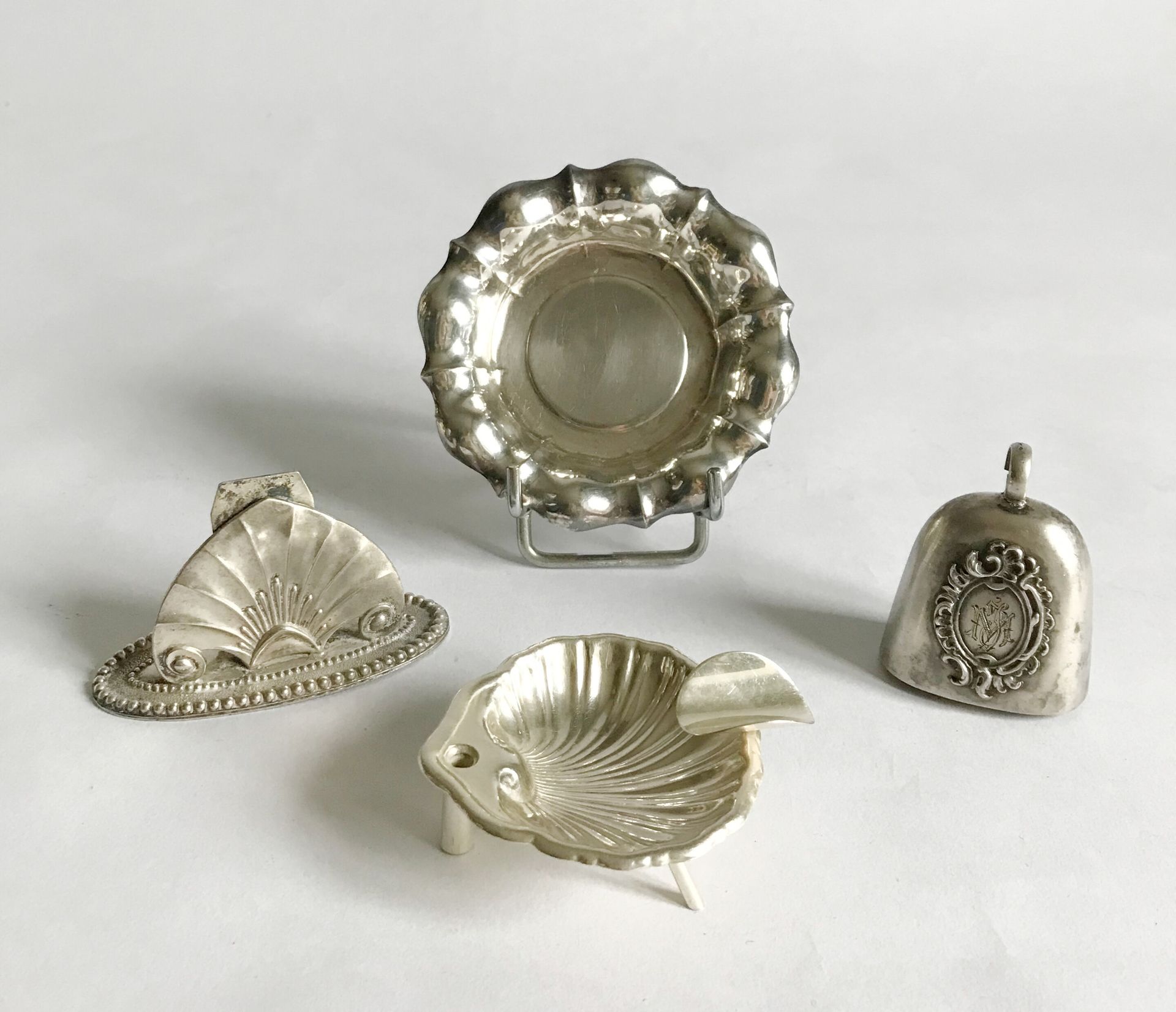 Null Set including : two small table ashtrays in foreign silver - a silver bell &hellip;