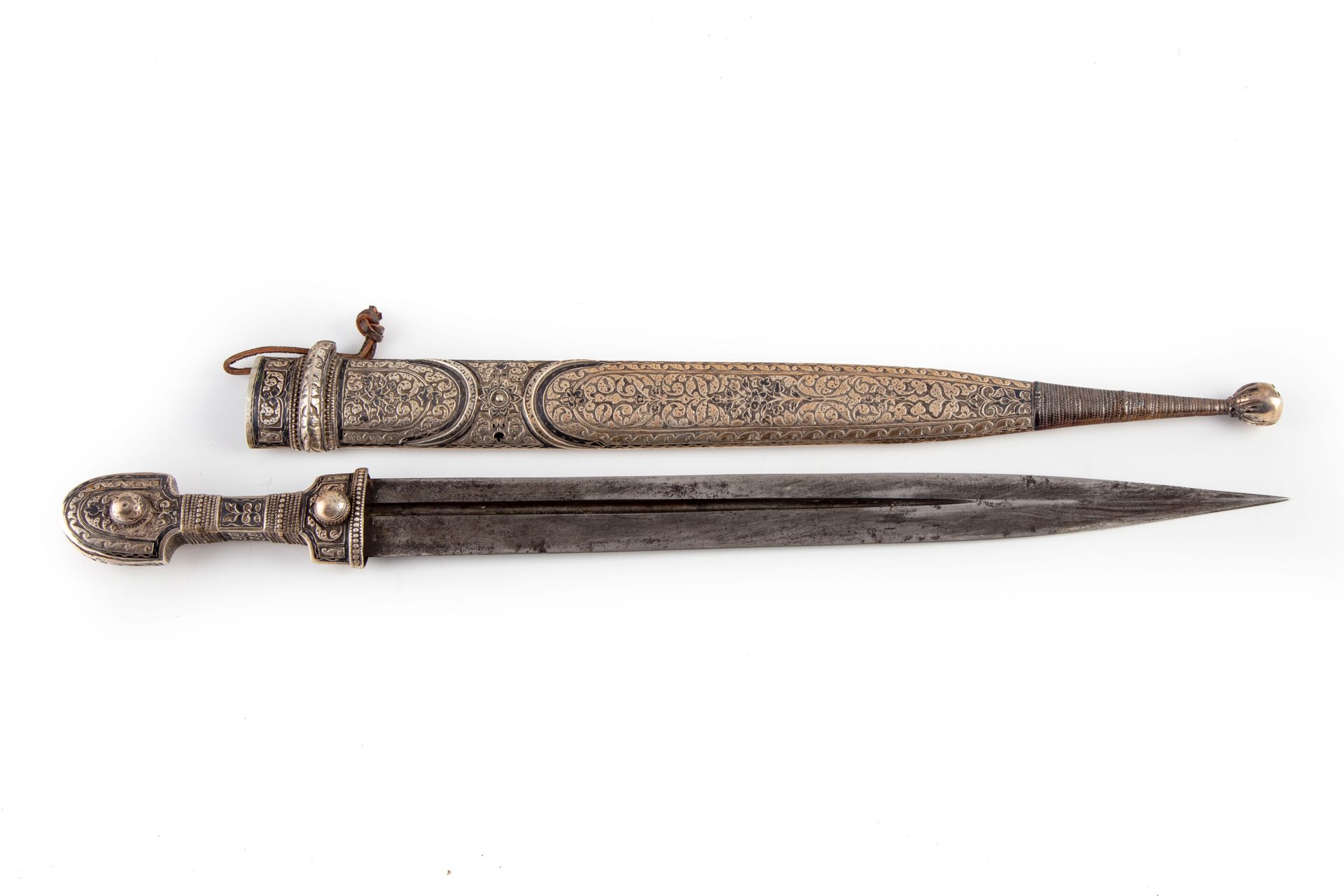 KINDJAL CAUCASIEN CAUCASIAN KINDJAL

Wooden handle covered with silver (?) richl&hellip;