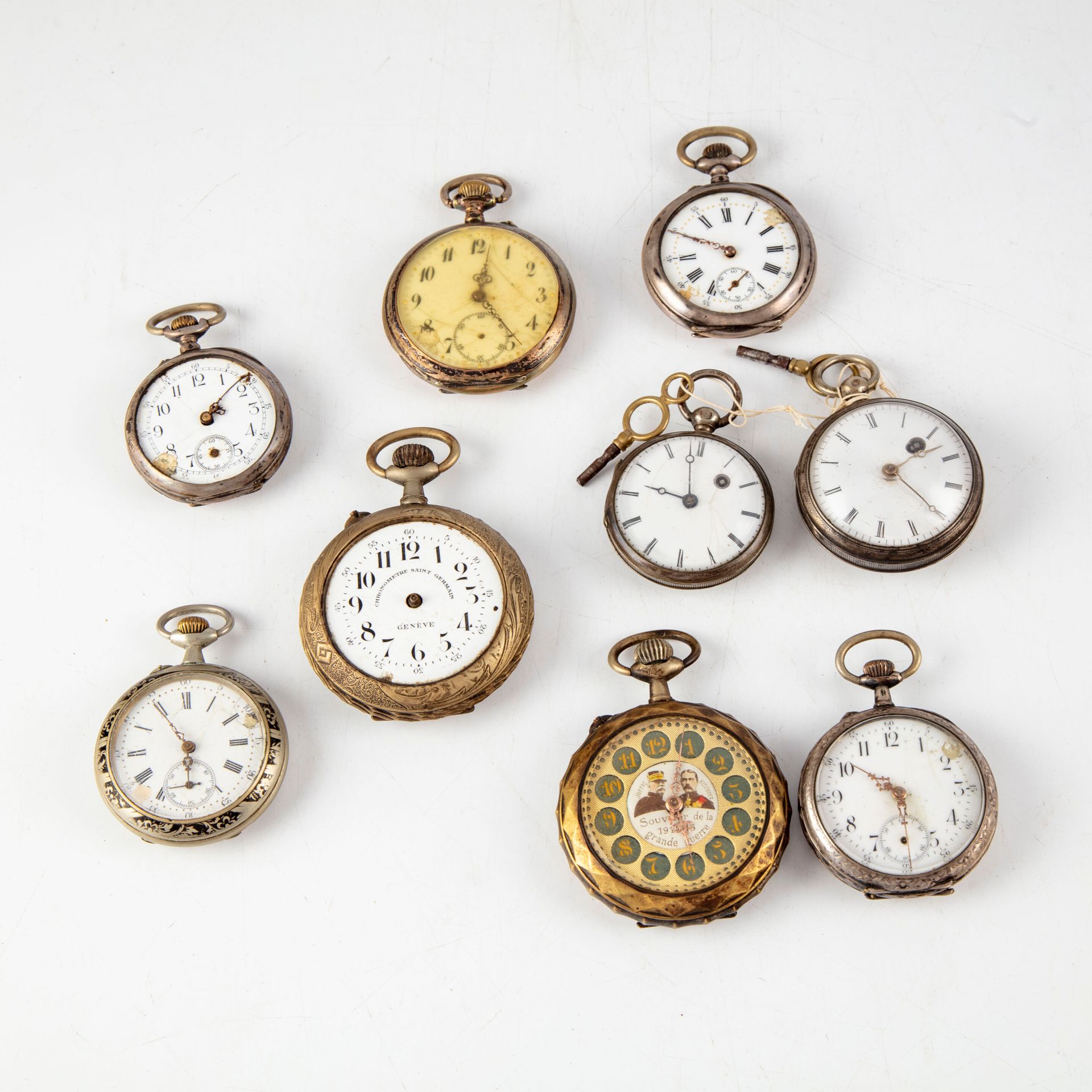 Null Conjunto de nueve relojes de bolsillo, entre ellos: un cronómetro Saint Ger&hellip;