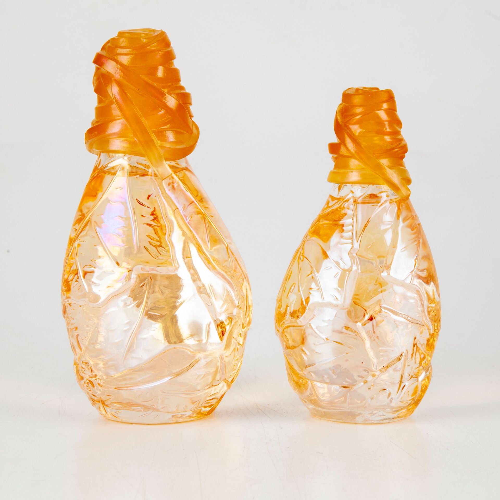 Null KENZO

Set of two bottles of perfume "Kashaya", dummy

H. 13 and 15,5 cm