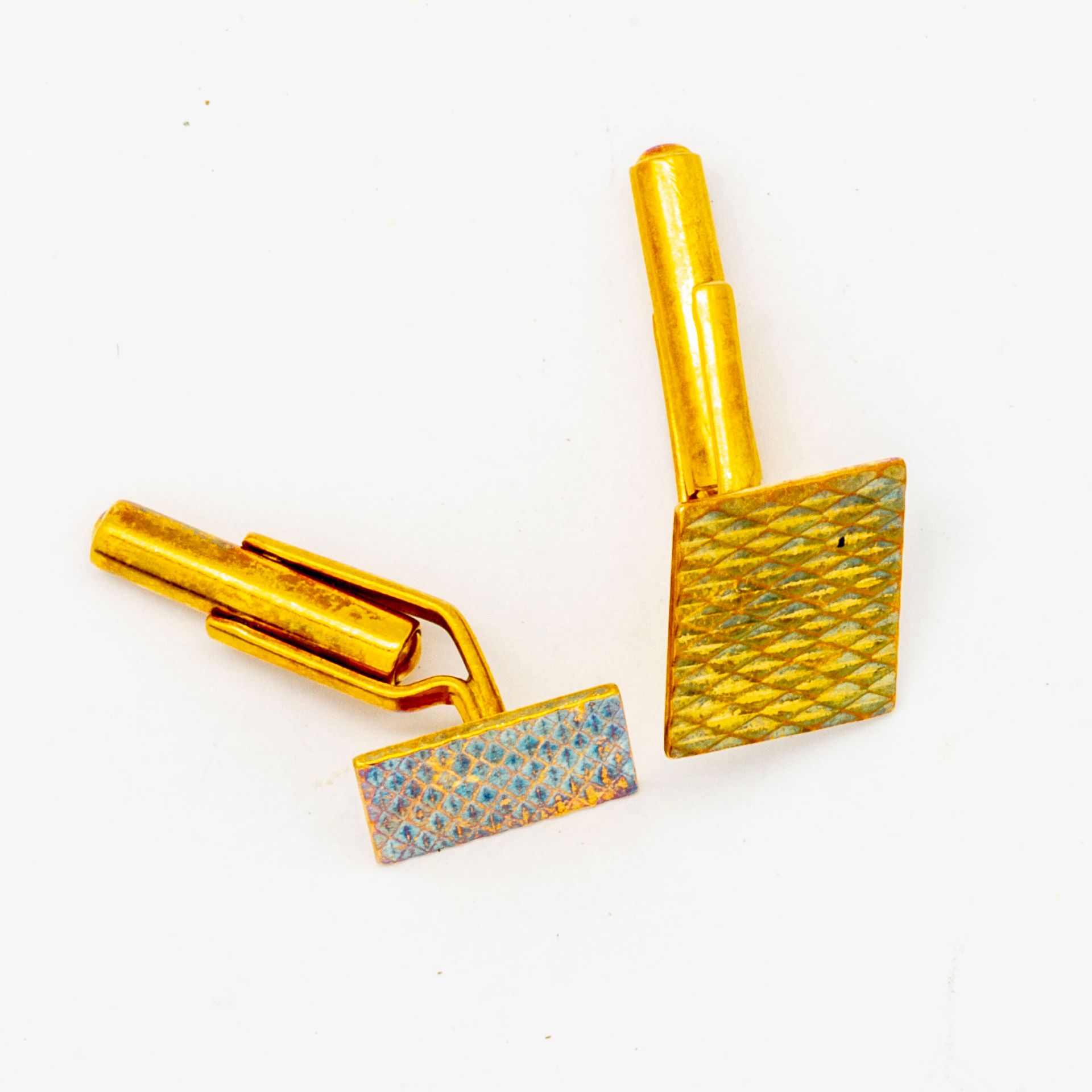 Null House of MECAN

Pair of yellow gold cufflinks 

weight : 6,8 g