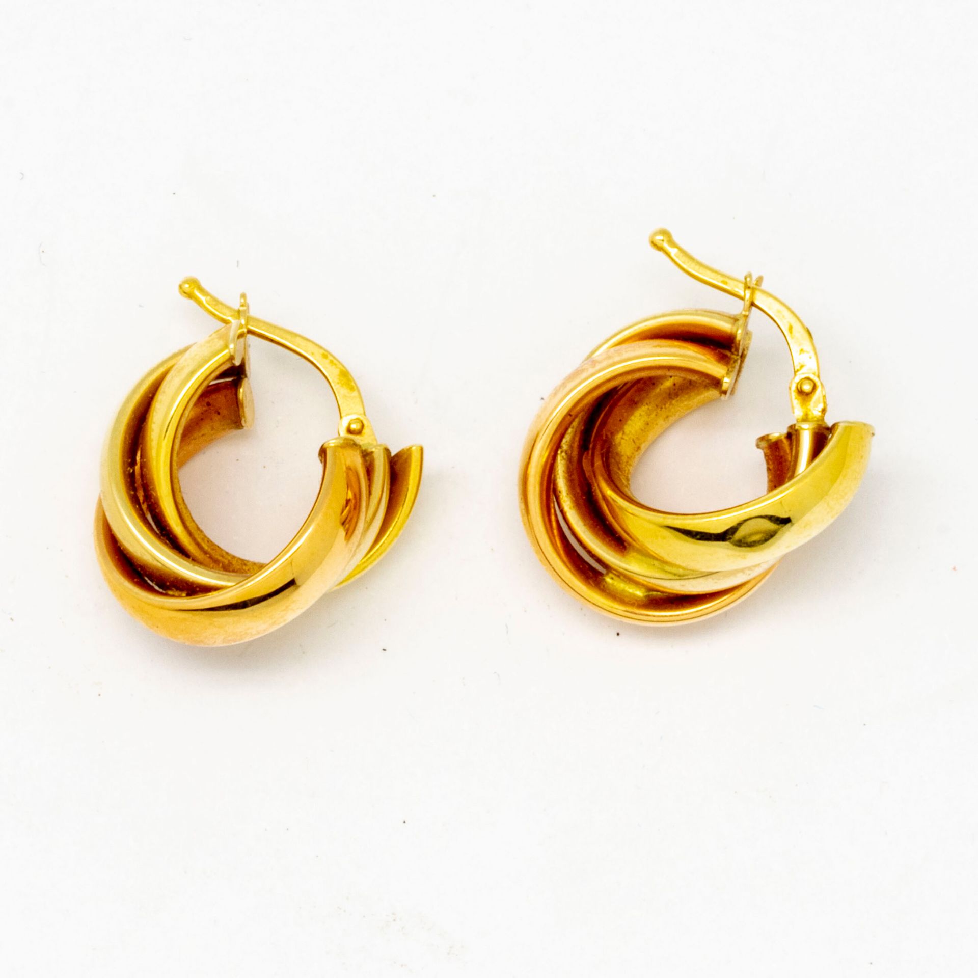 Null Pair of yellow gold earrings 

weight : 3,9 g