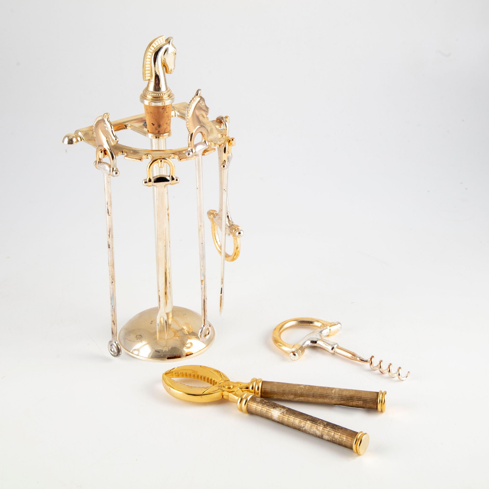 Null Display and utensils in gilded metal including thermometer, corkscrew, plie&hellip;