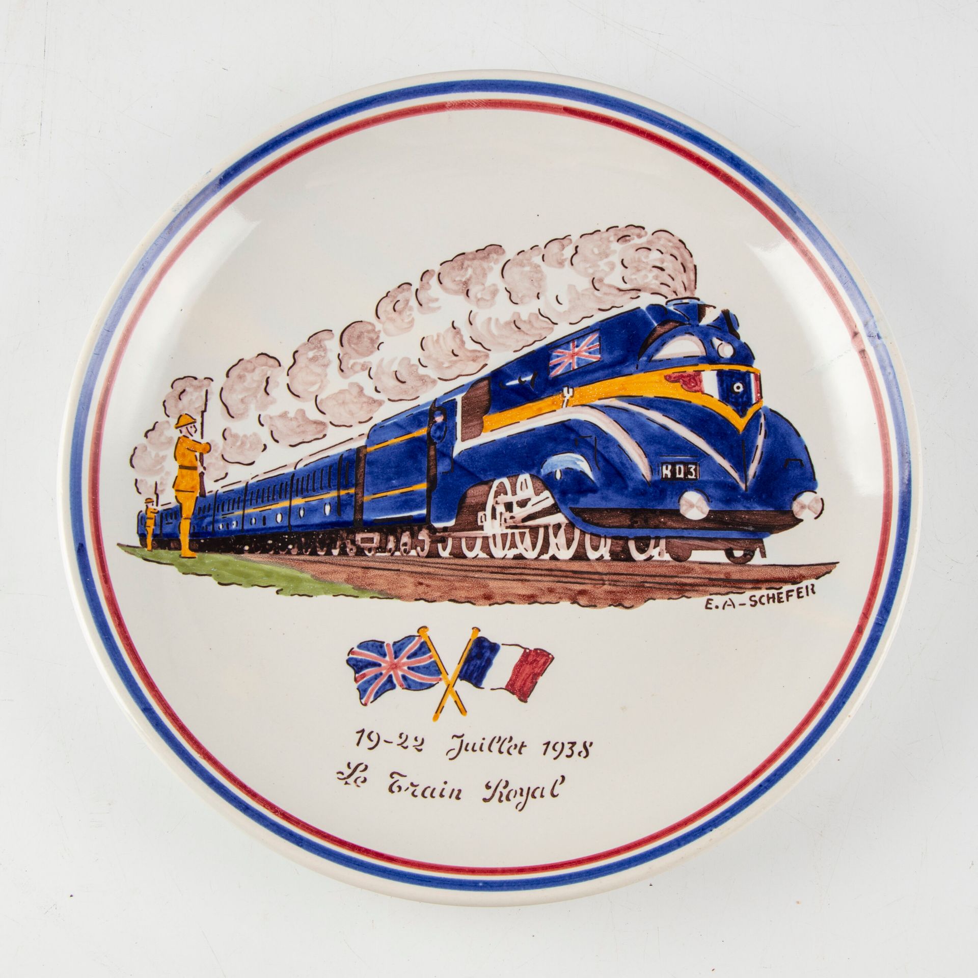 Null 在E.A SCHEFER之后--圣克莱芒制造厂

饰有 "1938年7月19日至22日皇家列车 "纪念品的釉陶盘

背面有签名，编号为70/100

&hellip;