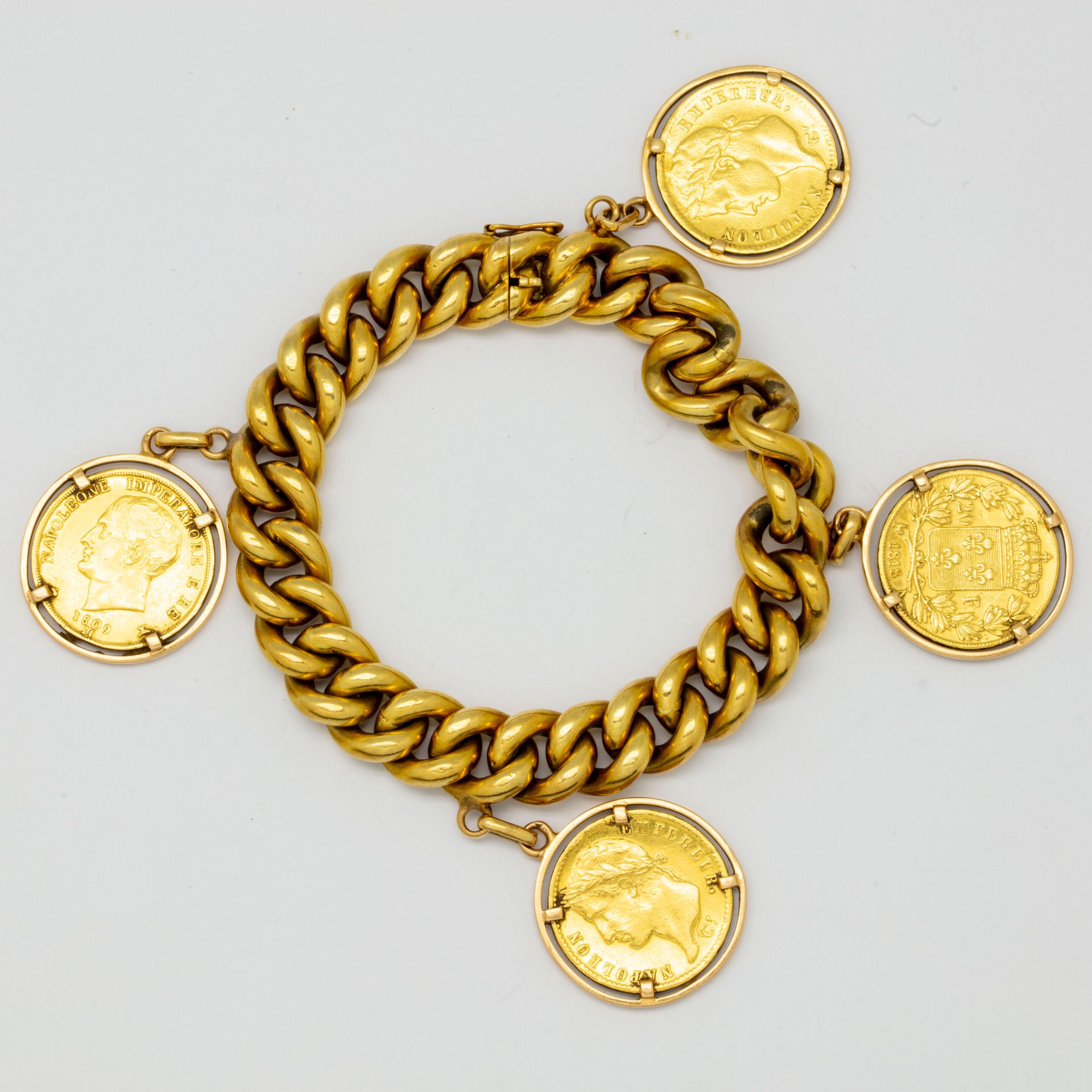Null 黄金大链节手镯，饰有金币，包括：1809 M的20法郎金币1枚，1813 A的20法郎金币1枚，1818 A的20法郎金币1枚，1811 A的20法郎&hellip;