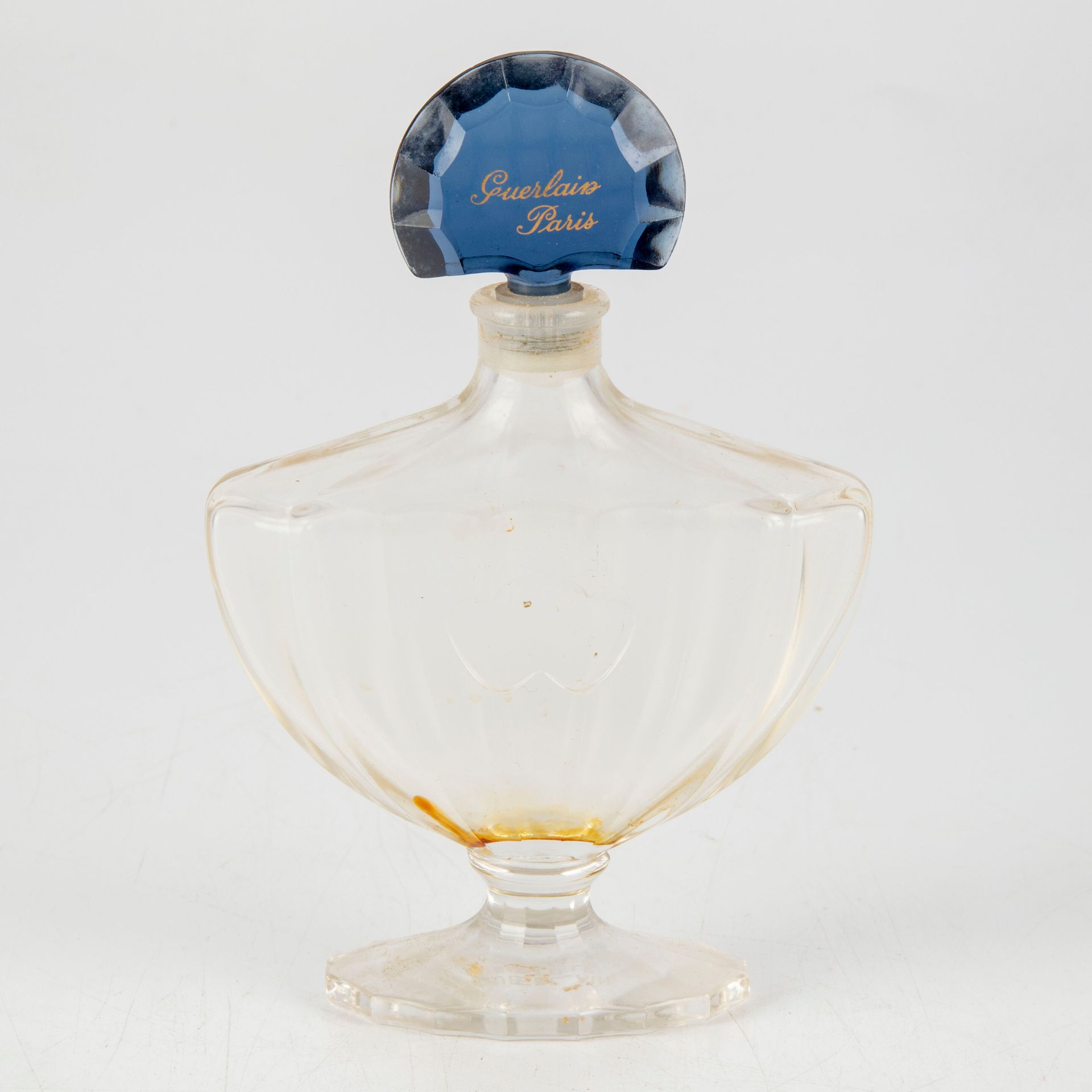 Null GUERLAIN House - Paris 

Fan-shaped Shalimar perfume bottle

H. 15 cm