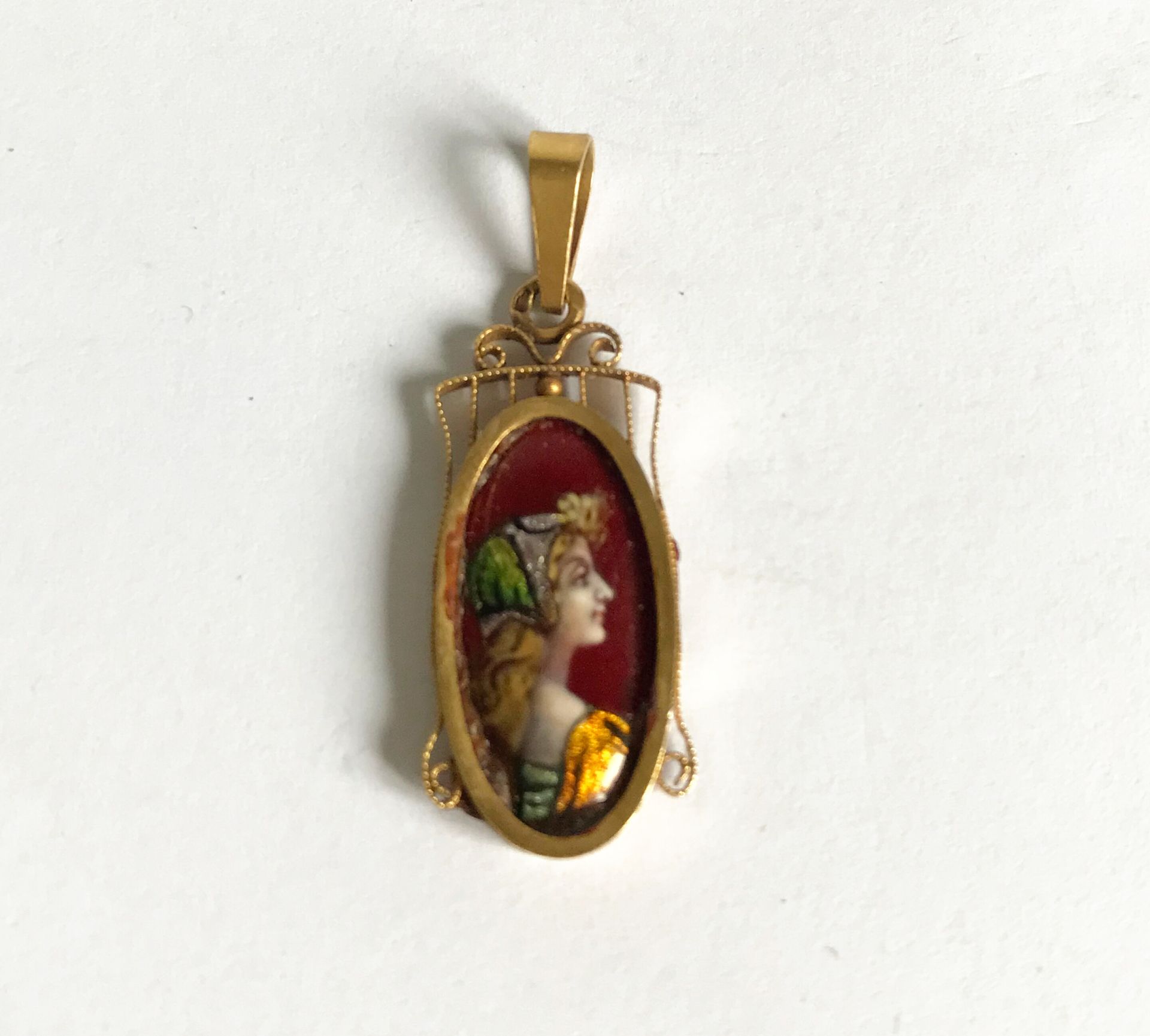 Null L. CLEMENT - Limoges

Petit pendentif ovale à monture en or rose orné d'un &hellip;