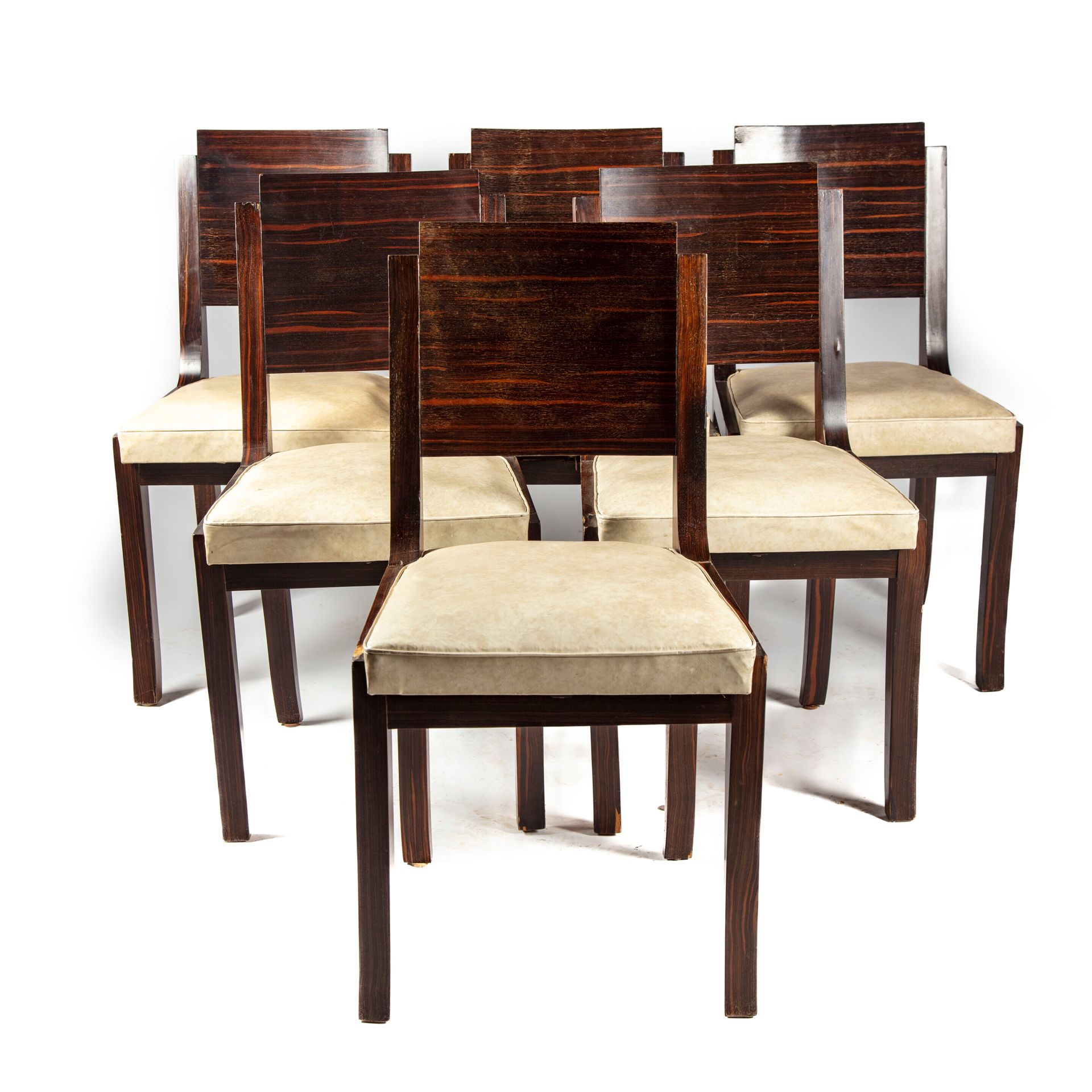 Null Suite of six chairs with rosewood veneer, banded backs, sheath legs. 
Art d&hellip;
