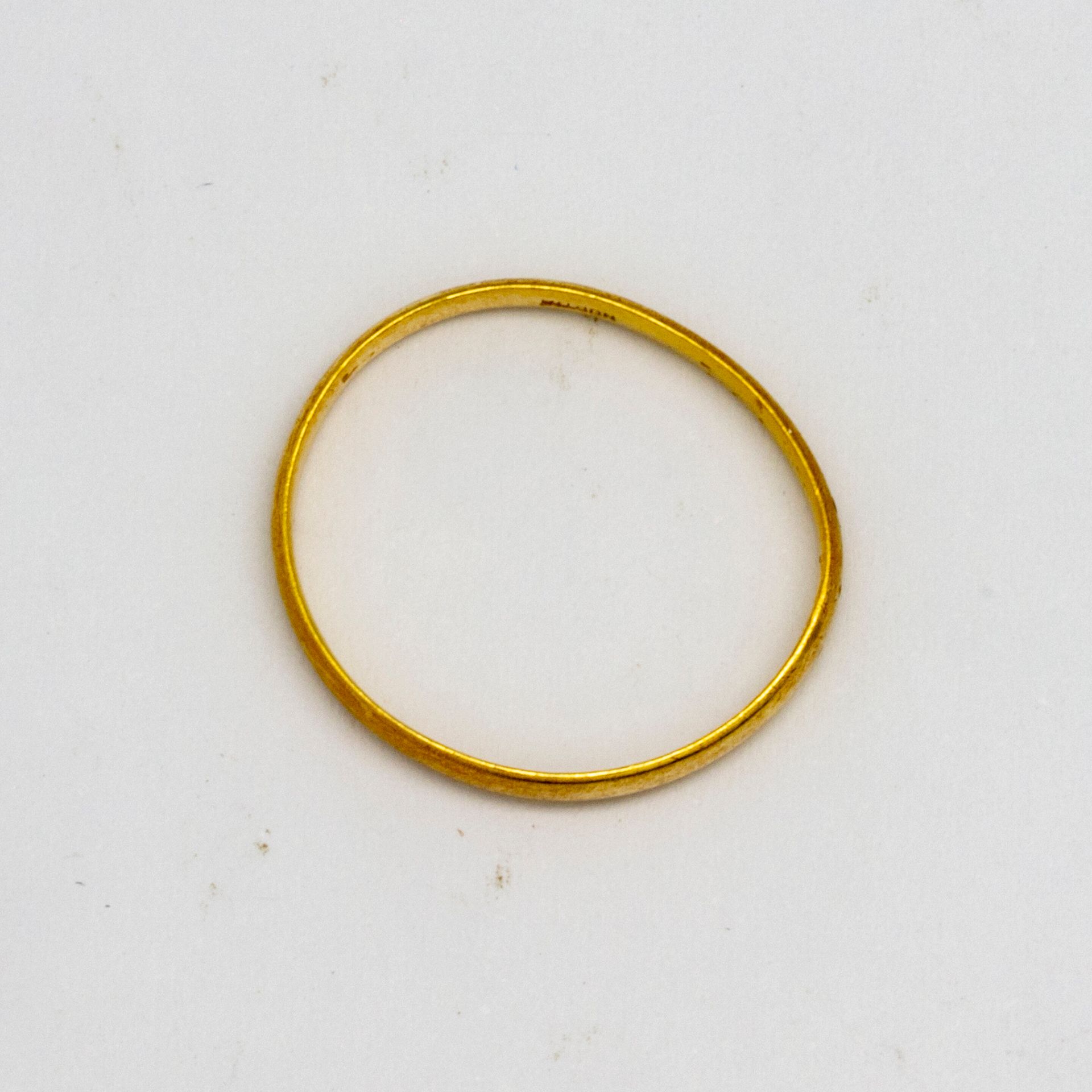 Null Anello nuziale in oro giallo 
Peso: 1 g