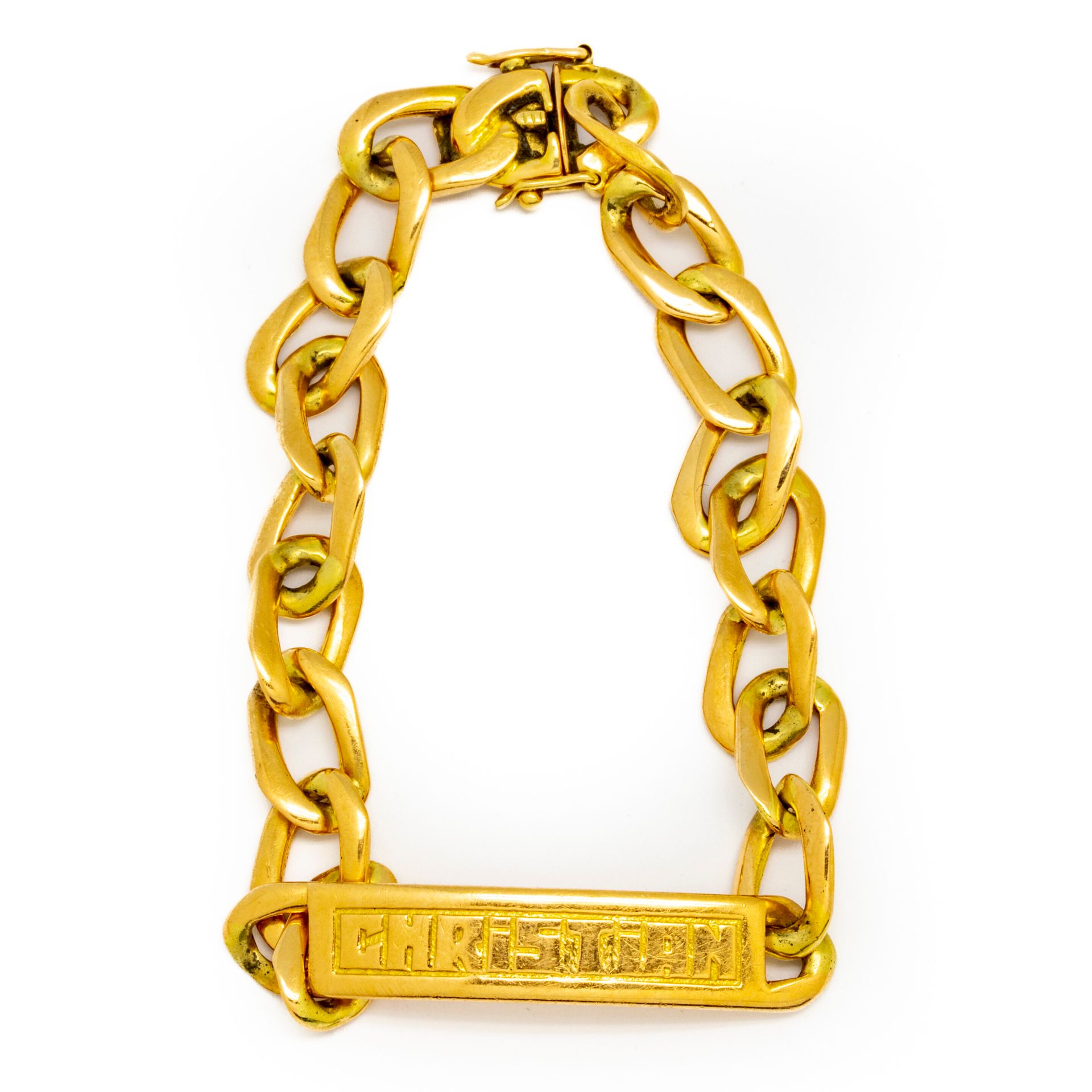 Null Curb in yellow gold, engraved "Christian
Weight : 27,8 g