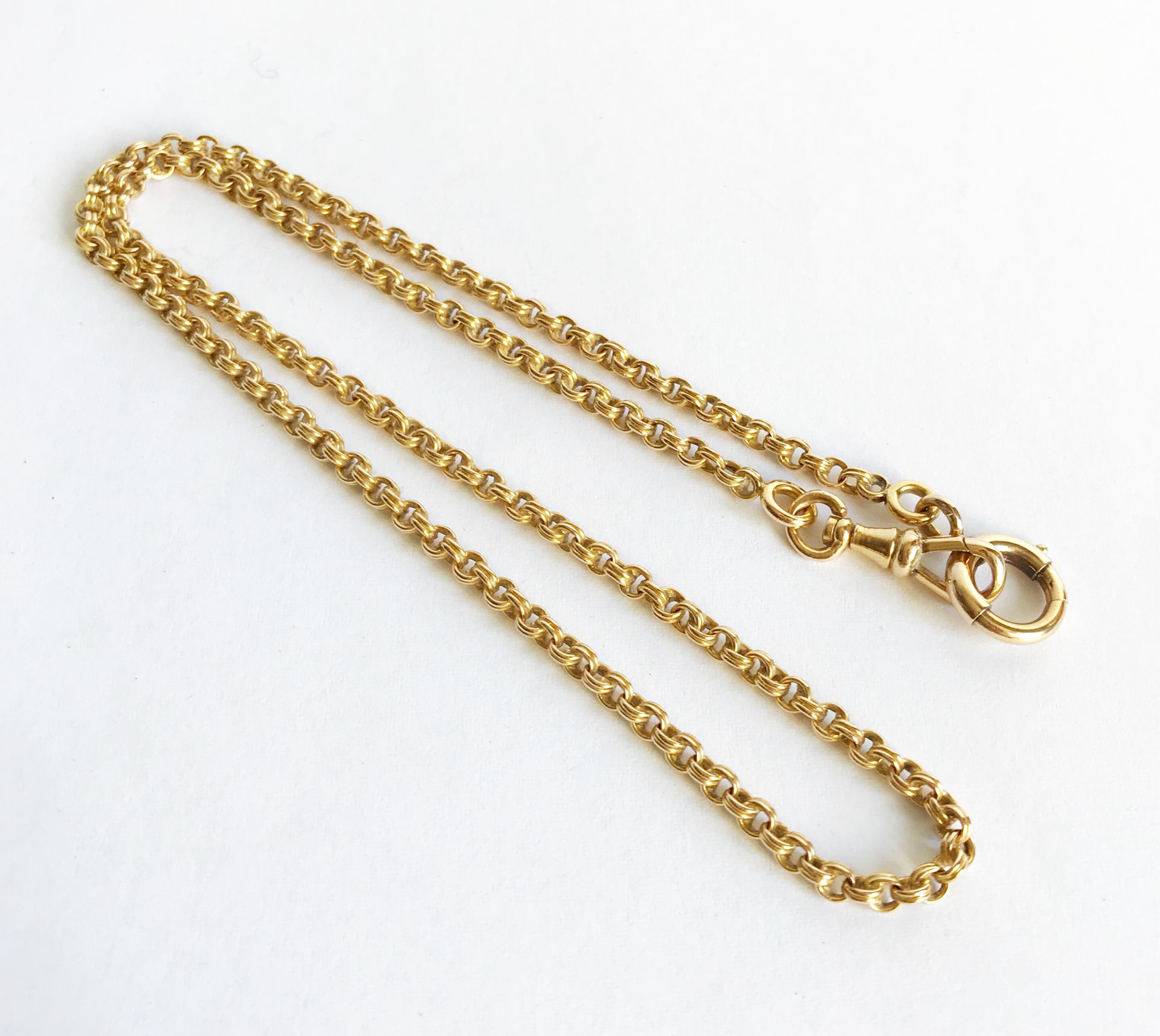 Null Yellow gold watch chain (18K/750th) with double links.
Weight : 12,35 g.