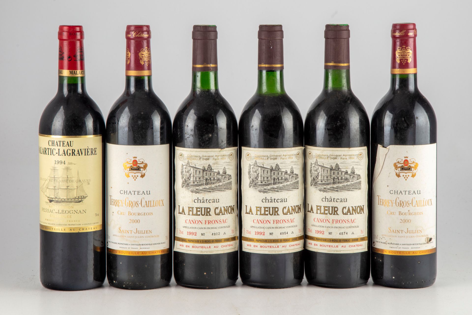 Null 6 bottles of which : 1 bottle CHATEAU MALARTIC-LAGRAVIERE 1994 Pessac-Léogn&hellip;