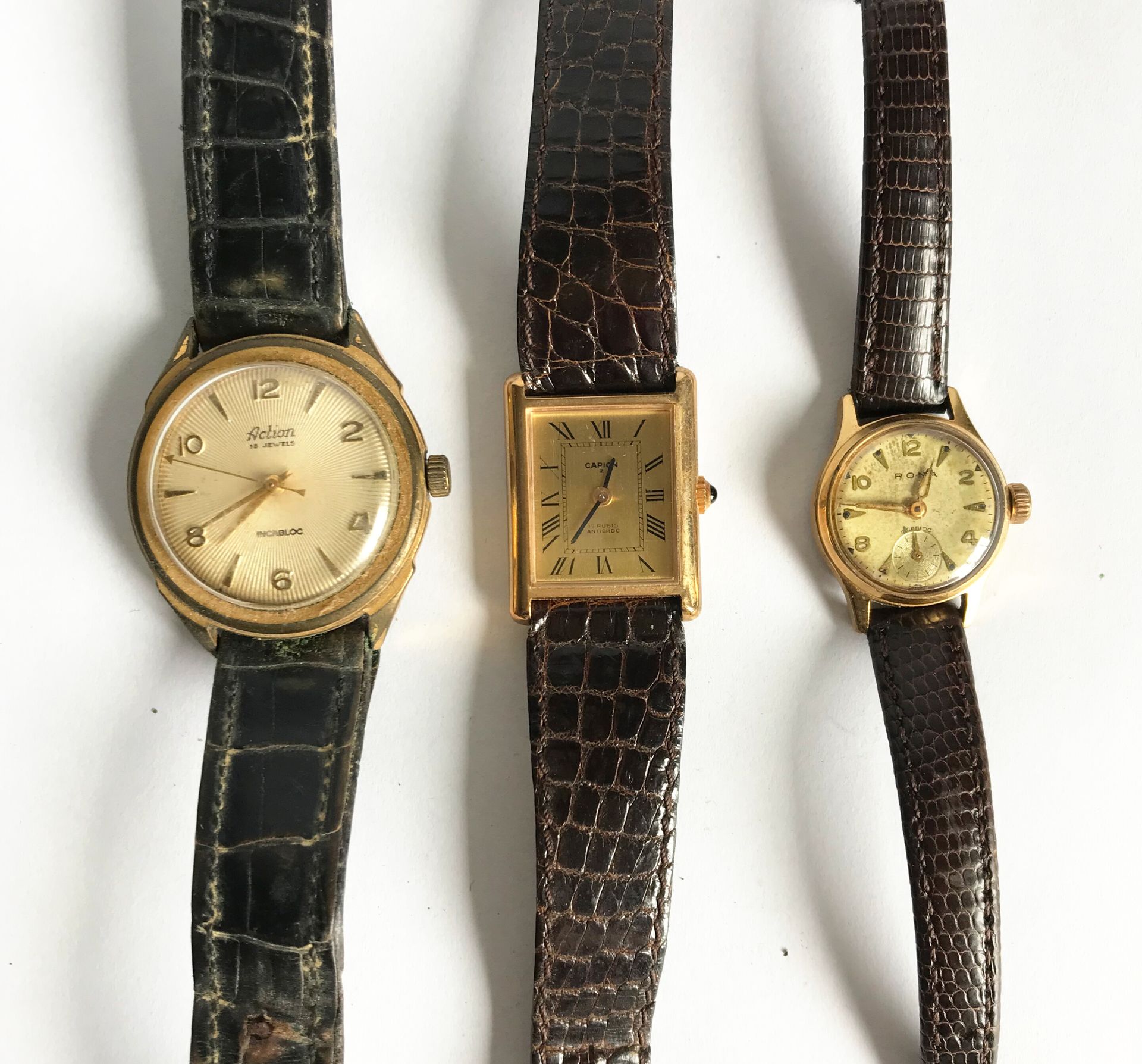 Null Set of three watches in gilded metal and leather strap