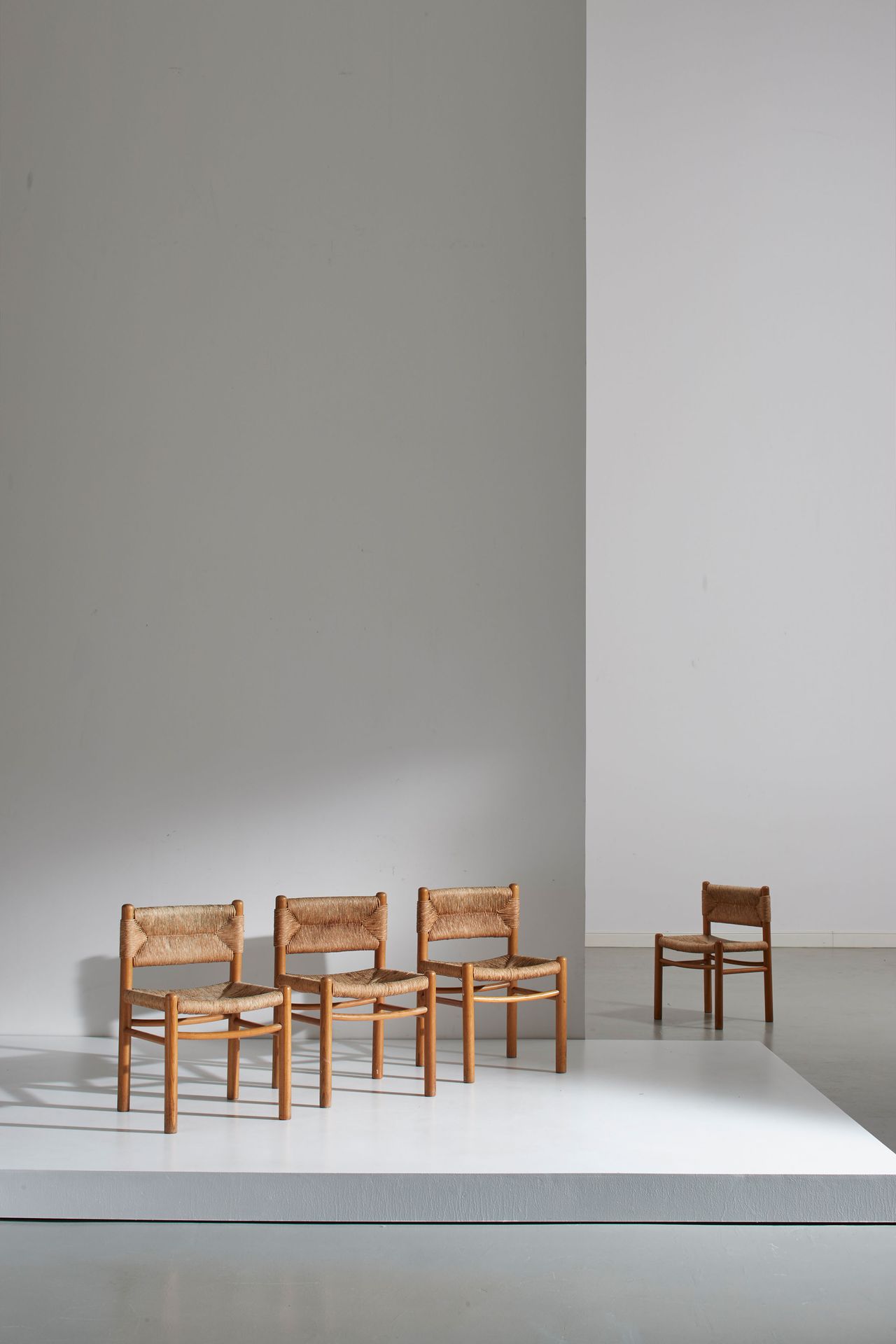 CHARLOTTE PERRIAND (ATTRIB. A) Four chairs. Conifer wood, woven river straw. Fra&hellip;