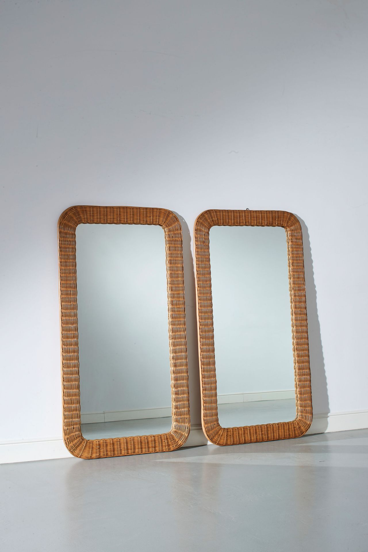 Manifattura Italiana Pair of mirrors. Woven wicker, mirrored glass. Italy 1960s.&hellip;