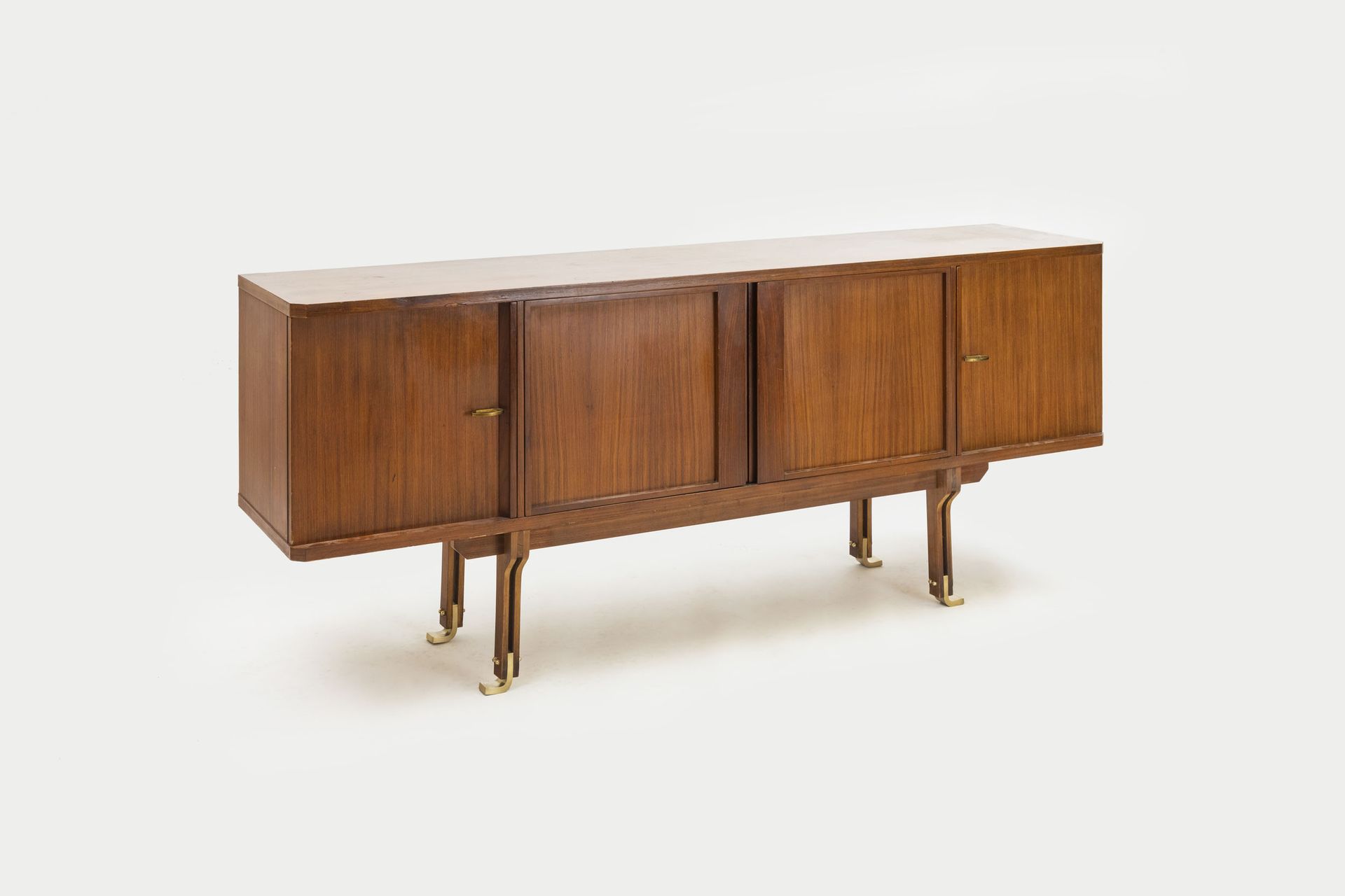 MANIFATTURA ITALIANA Sideboard. Exotic wood, solid brass. Late 1950s. 
91x220x48&hellip;