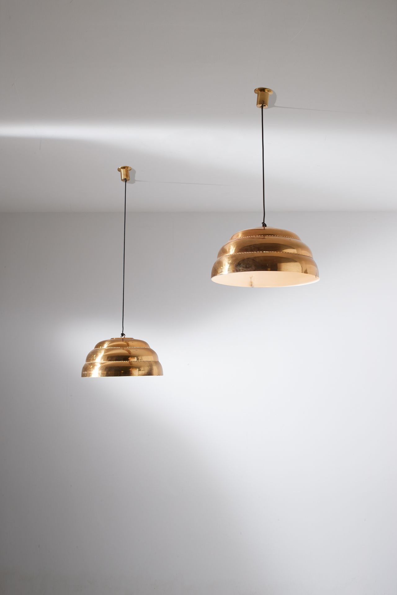 ANDRES PEHRSON (ATTRIB. A) Pair of pendant lamps. Brass, painted brass, ground a&hellip;