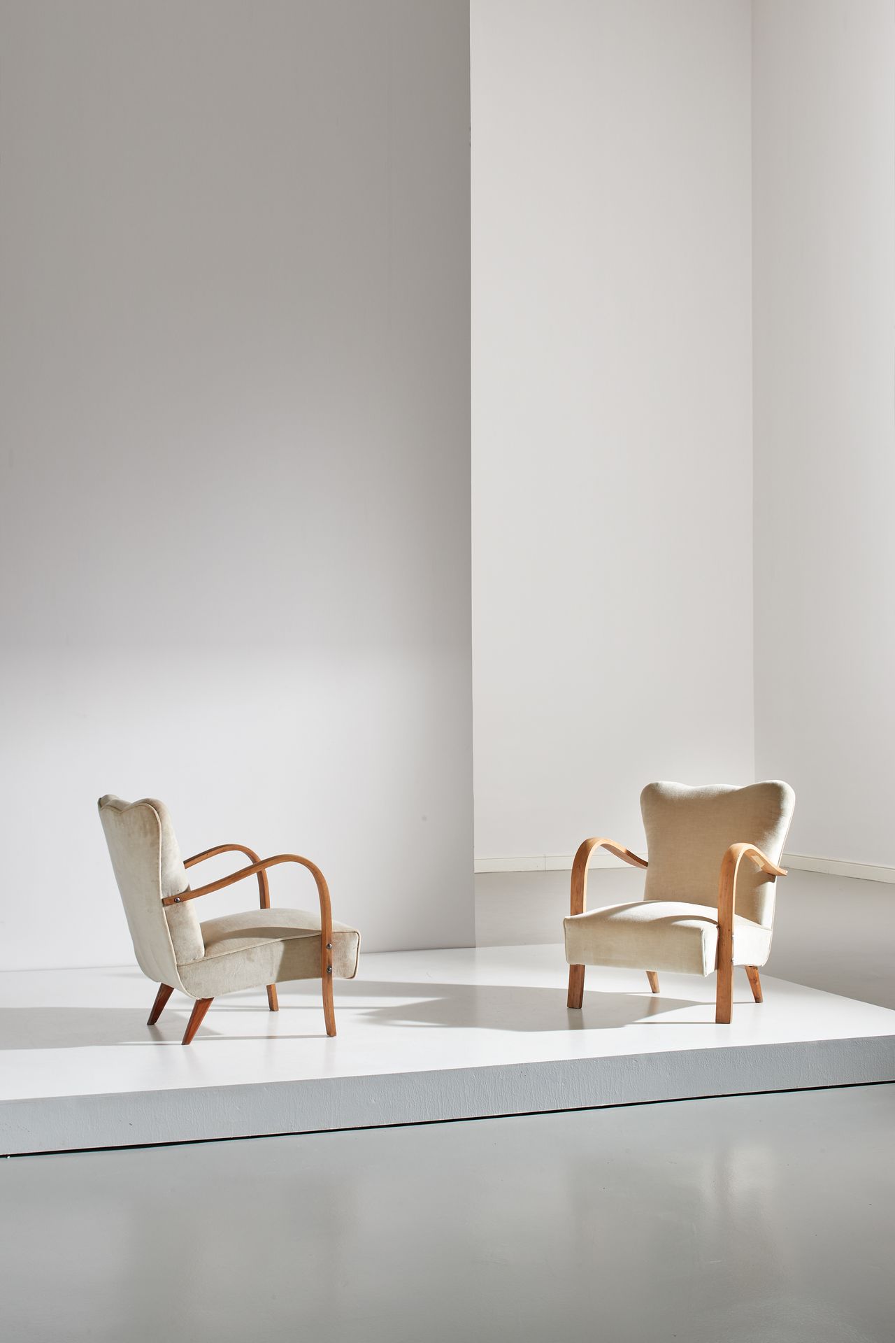 MANIFATTURA ITALIANA Pair of armchairs. Curved beech wood, upholstered fabric. I&hellip;