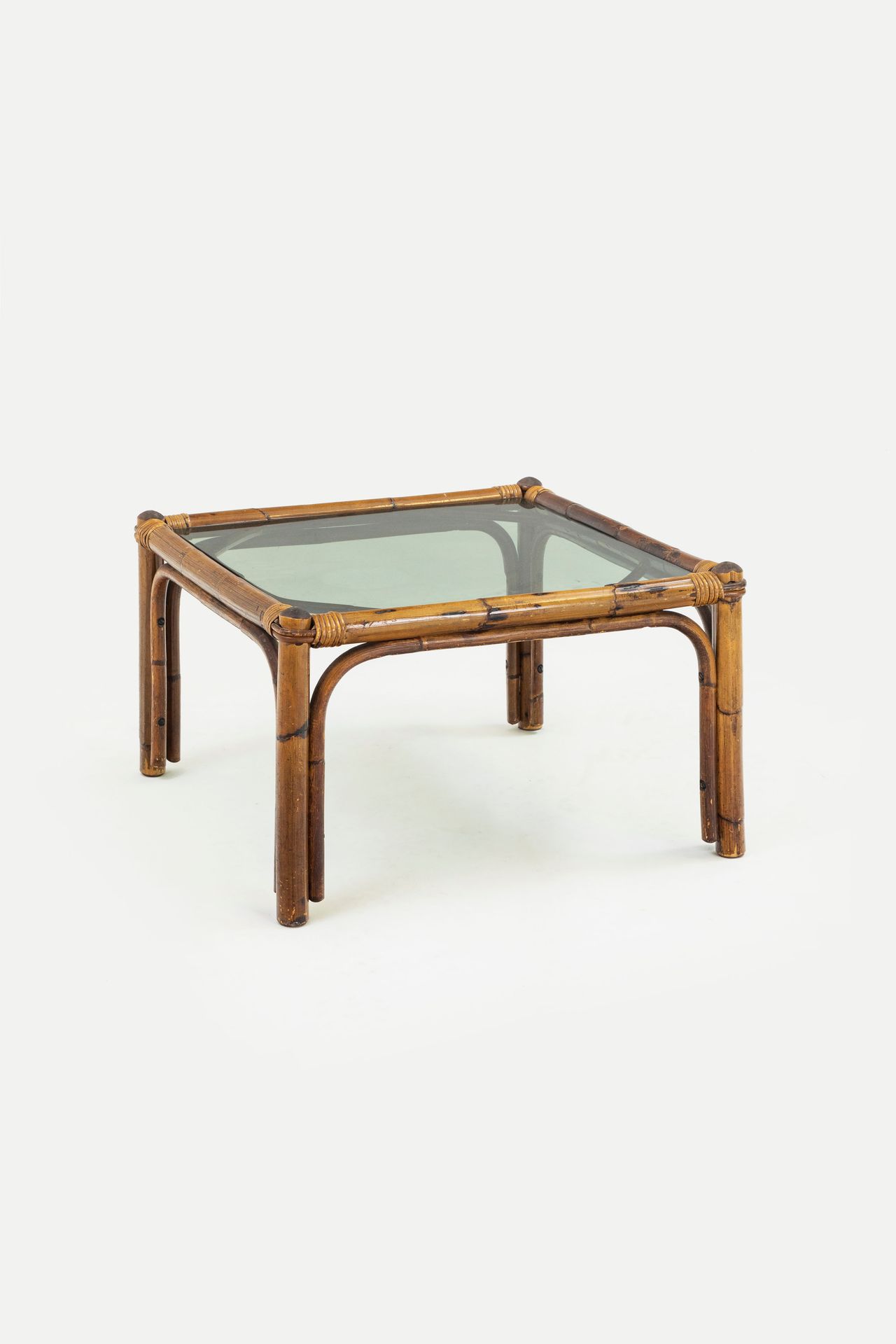 MANIFATTURA ITALIANA Side table. Canna d' India, ground crystal. 1960s.
Cm 40x63&hellip;