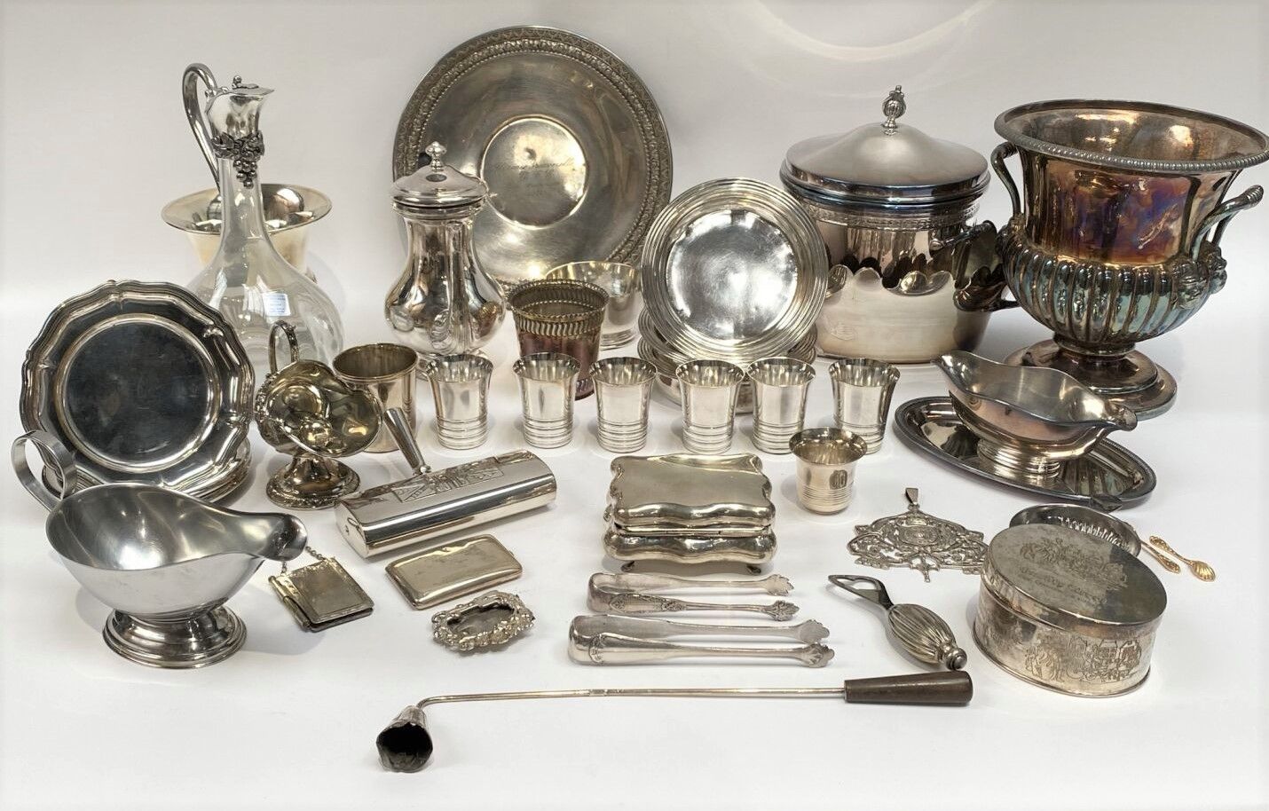 Null SET IN SILVER METAL including goblets, a crystal carafe, a sauceboat, a tea&hellip;